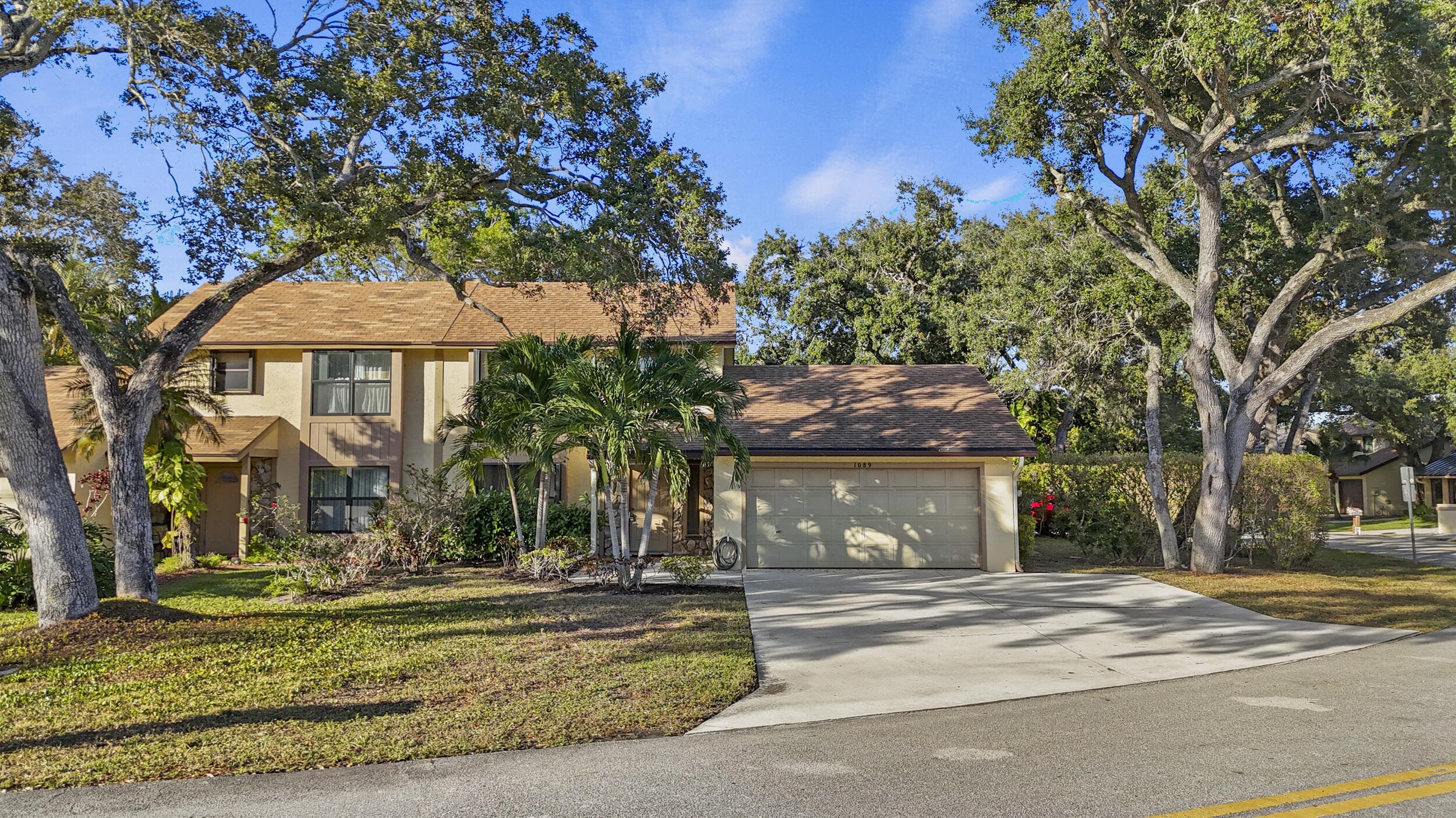 1089 Raintree Drive, Palm Beach Gardens, FL 33410 — photo 1 of 38