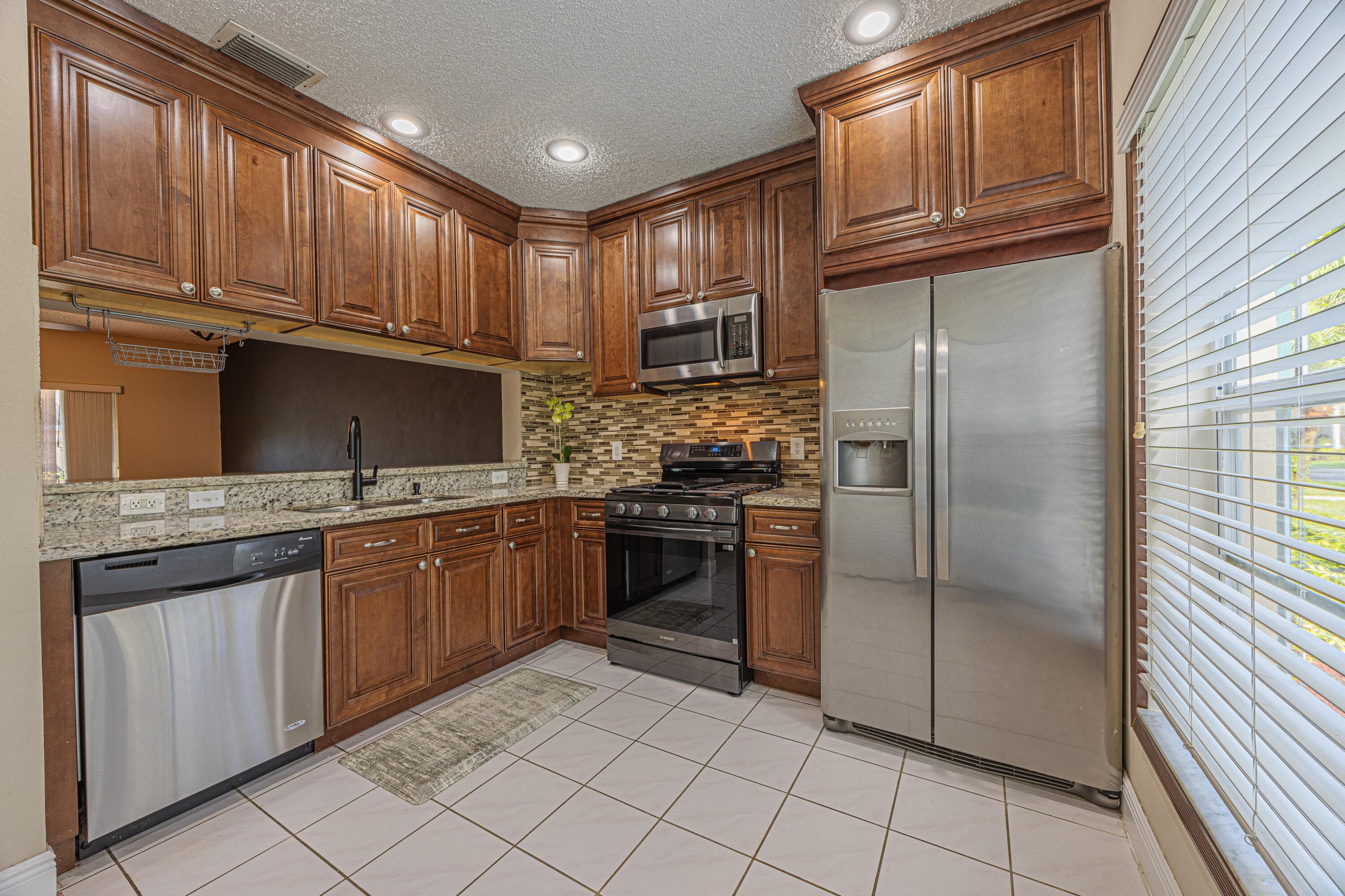 10931 Sea Hibiscus Lane, Tamarac, FL 33321 — photo 1 of 36