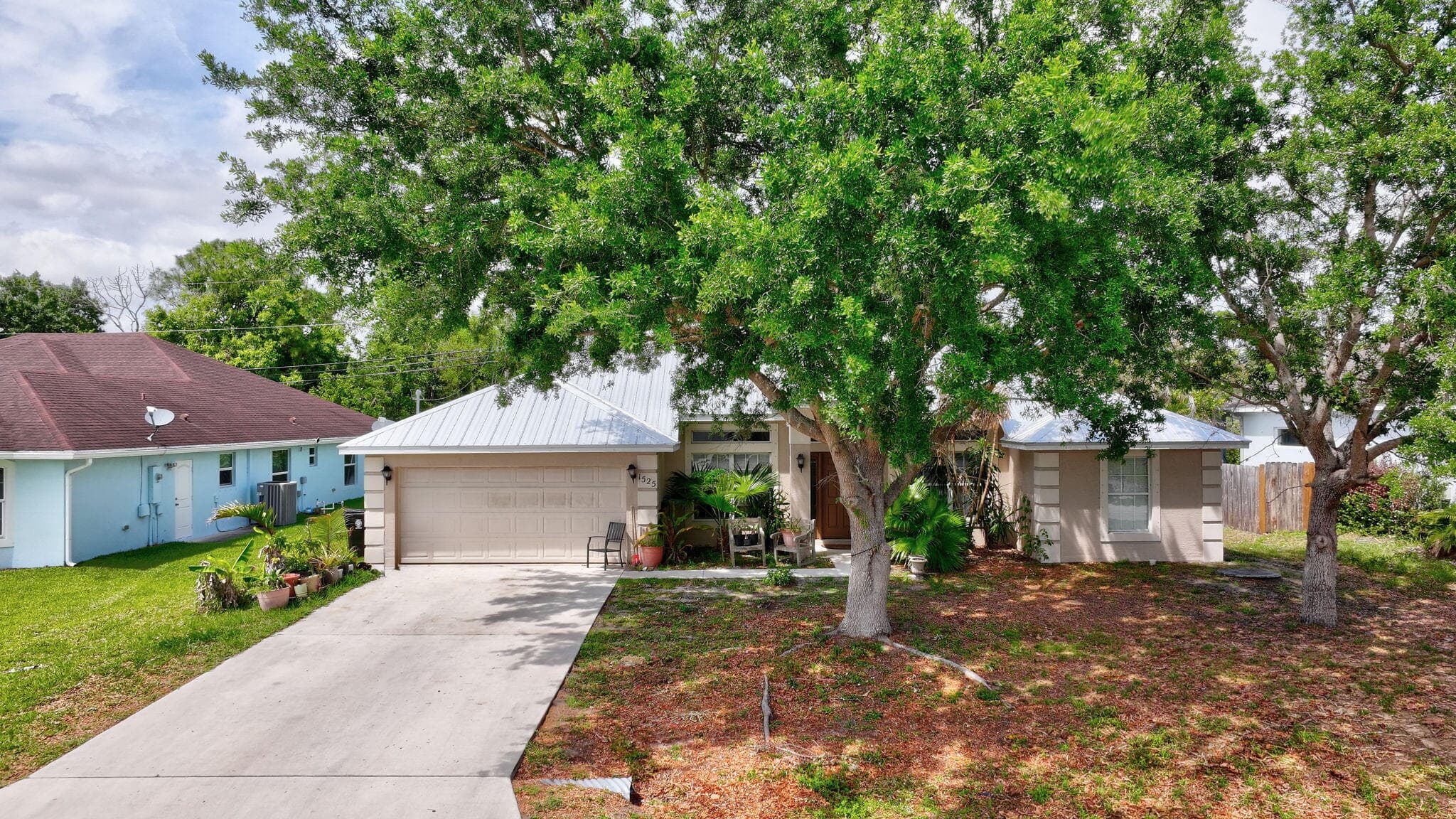 1525 SW Falmouth Avenue, Port St. Lucie, FL 34953 — photo 1 of 27