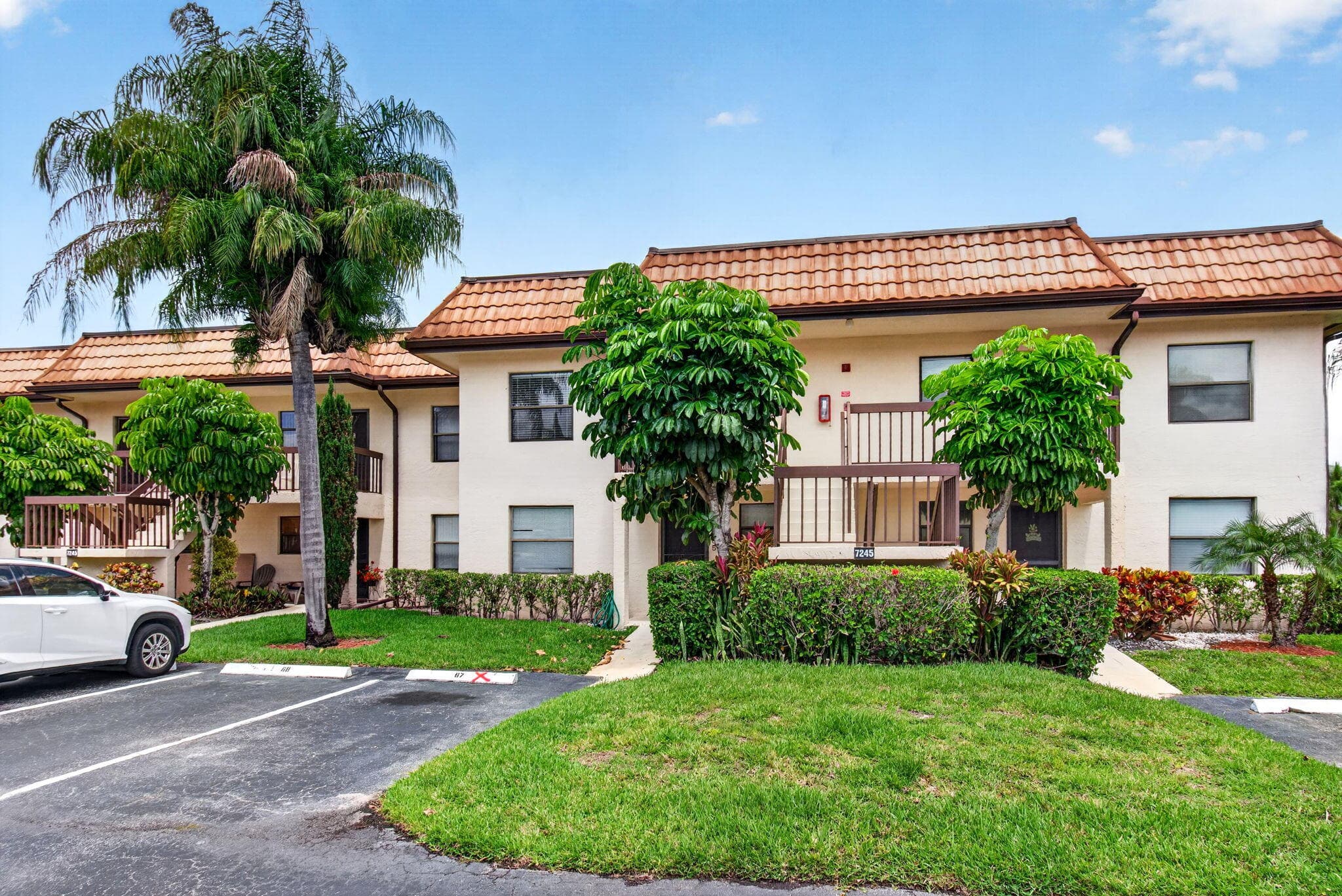 7245 Golf Colony Court 205, Lake Worth, FL 33467 — photo 1 of 57