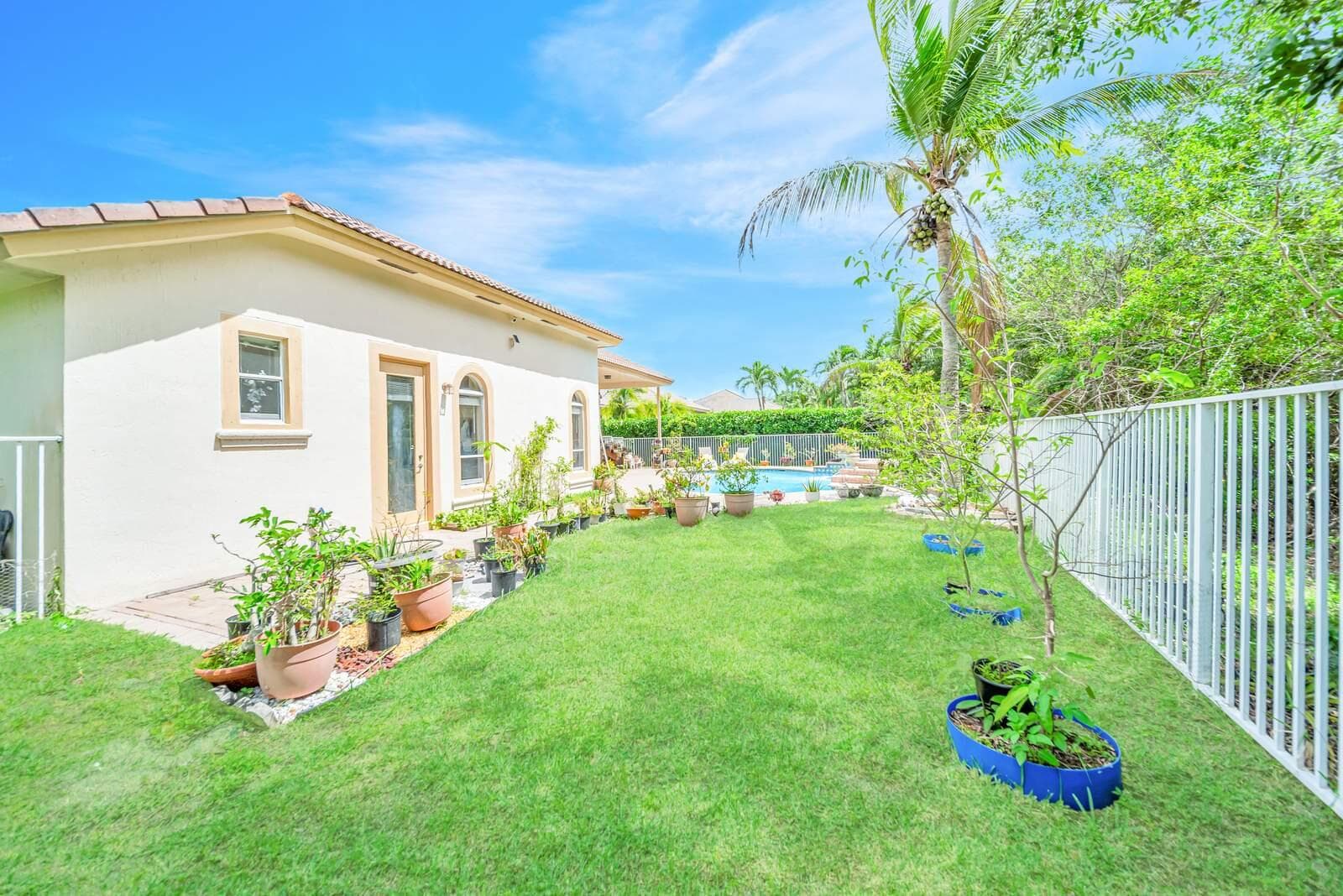 6169 NW 53rd Circle, Coral Springs, FL 33067 — photo 56 of 76