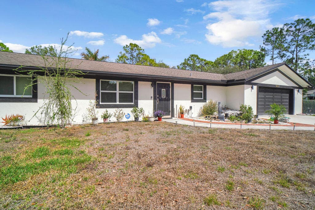 18057 N 40th Run N, The Acreage, FL 33470 — photo 1 of 62
