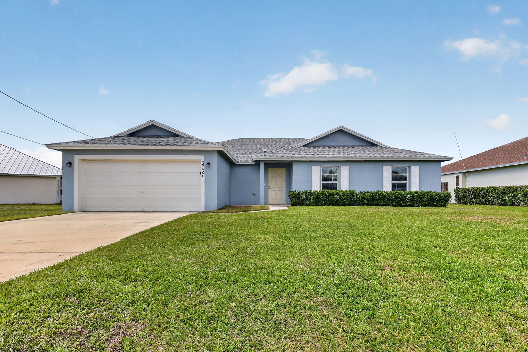 5737 NW Jigsaw Lane, Port St. Lucie, FL 34986 — photo 1 of 46