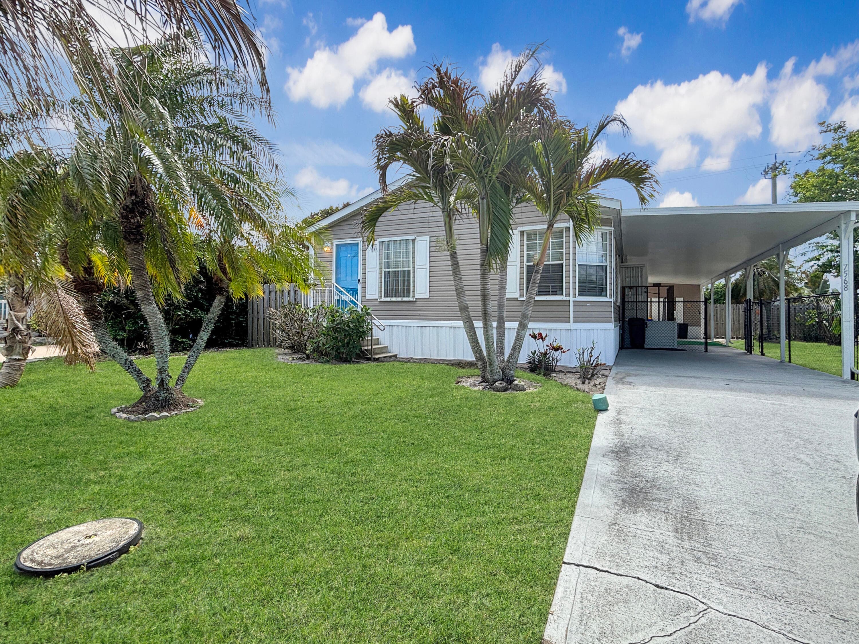 7568 SE Swan Avenue, Hobe Sound, FL 33455 — photo 2 of 29