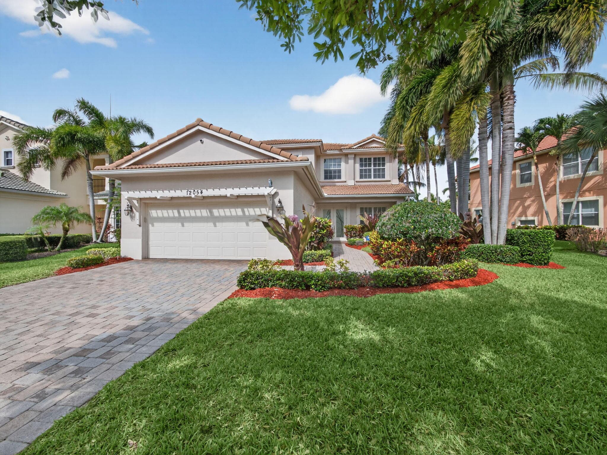 12054 Aviles Circle, Palm Beach Gardens, FL 33418 — photo 1 of 58