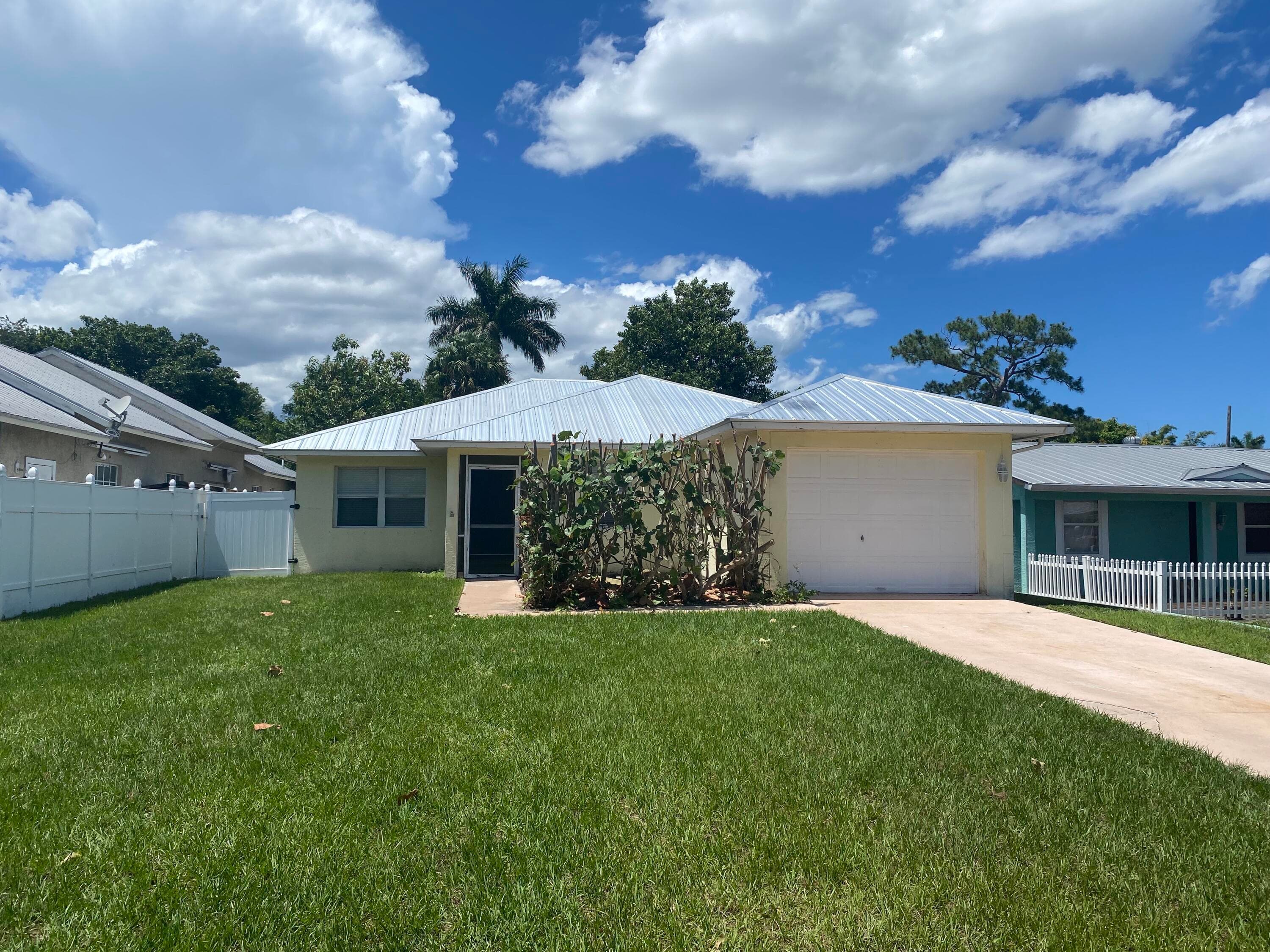 1057 SW Spruce Street, Palm City, FL 34990 — photo 1 of 12