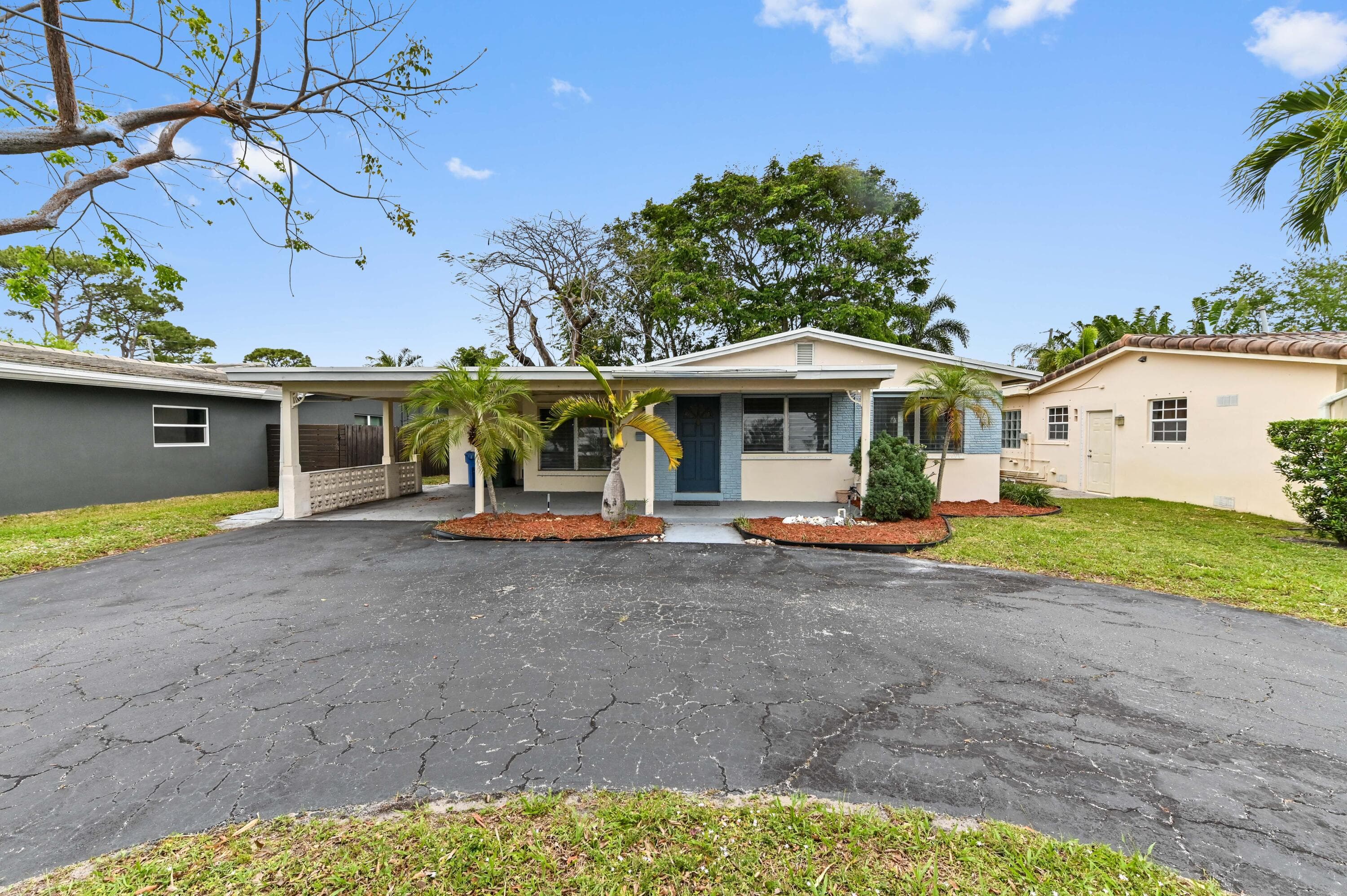 1727 NE 37th Street, Oakland Park, FL 33334 — photo 1 of 34