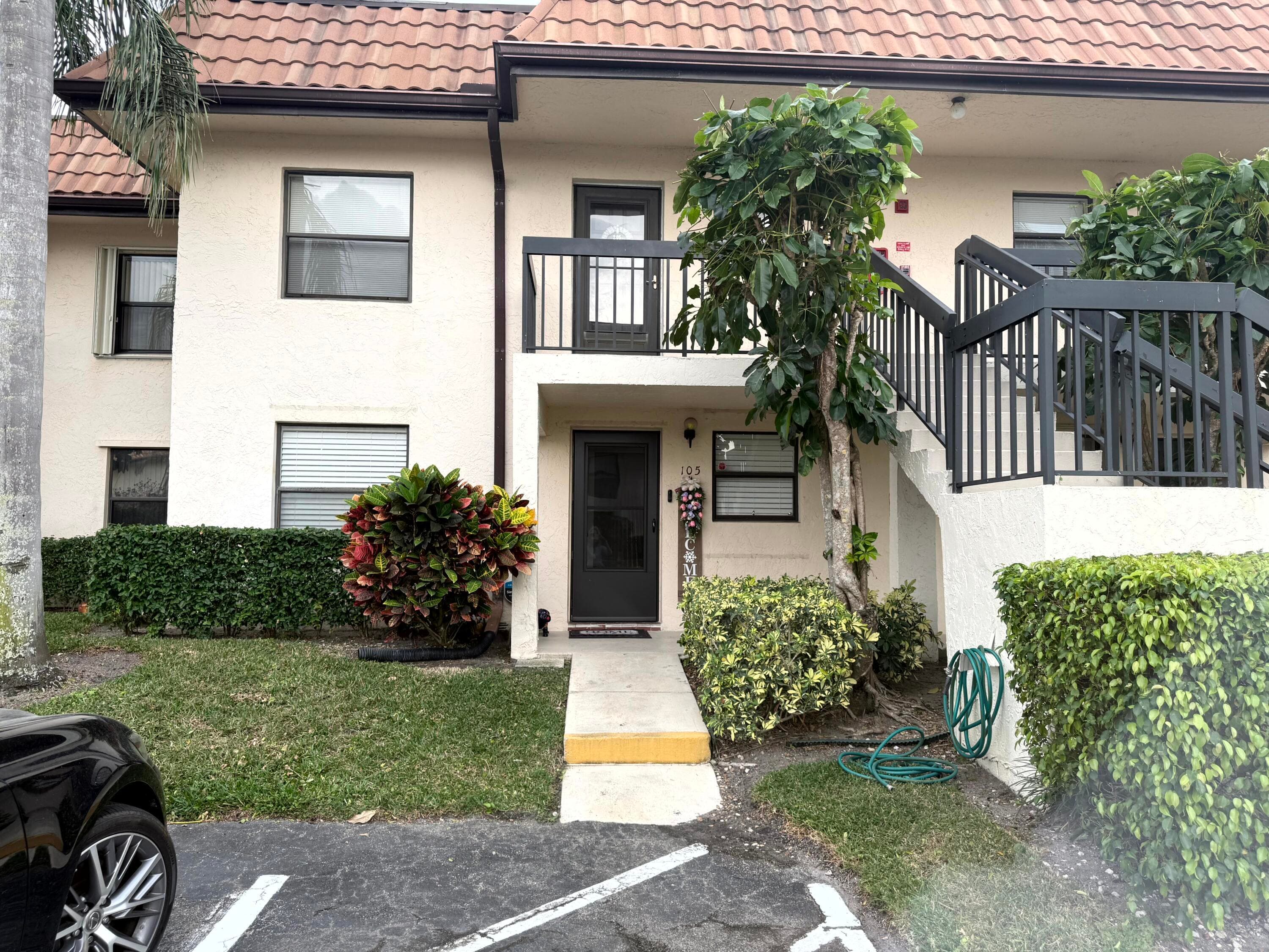 7190 Golf Colony Court 105, Lake Worth, FL 33467 — photo 1 of 31