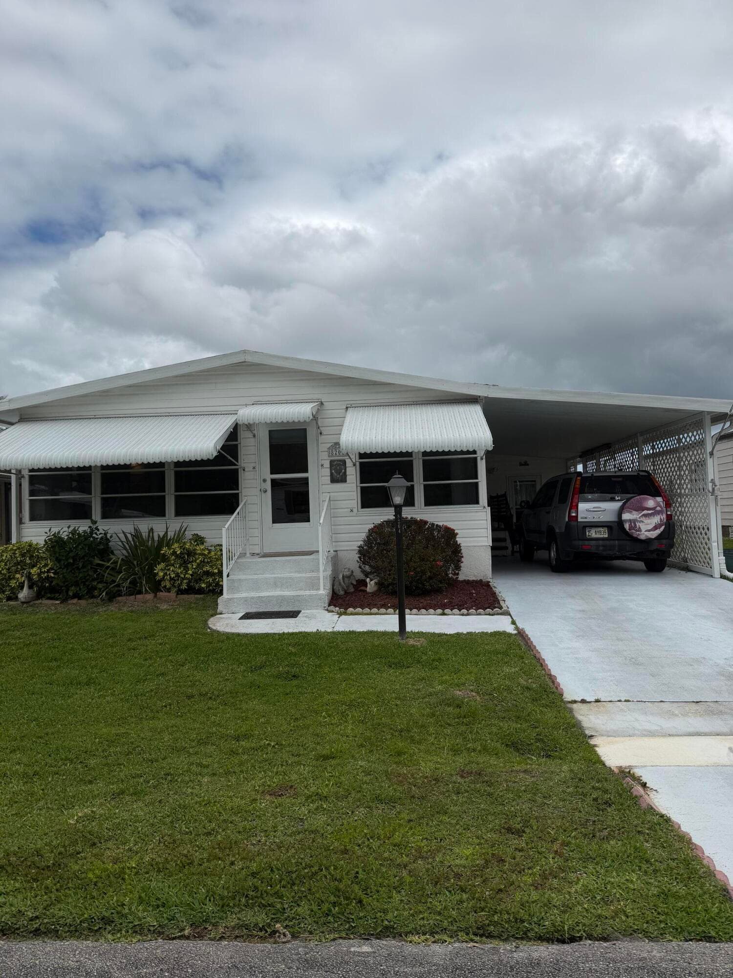 8204 W Bitterbush Lane, Port St. Lucie, FL 34952 — photo 1 of 65