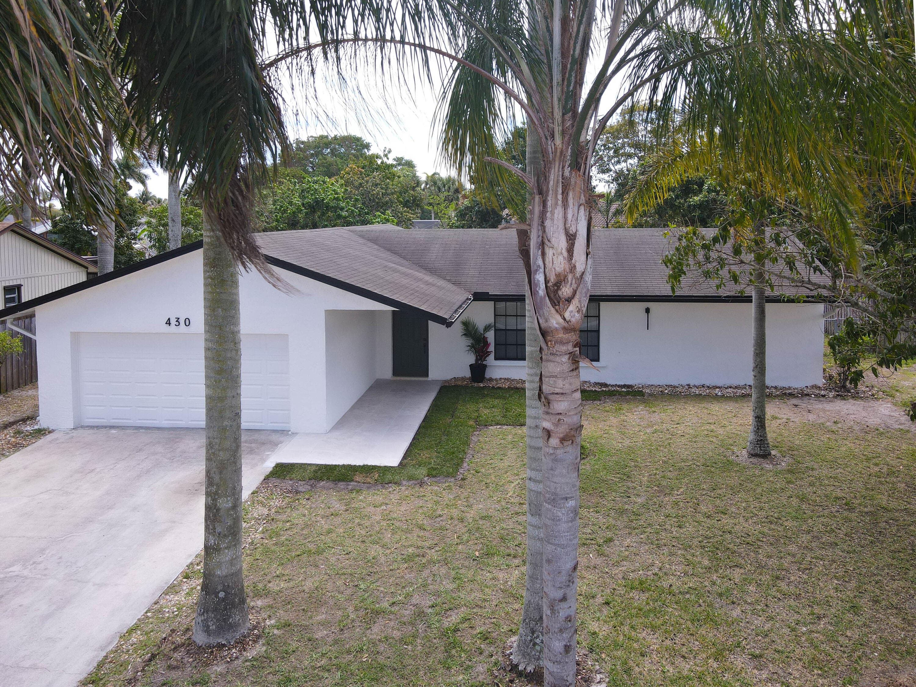 430 La Mancha Avenue, Royal Palm Beach, FL 33411 — photo 42 of 56