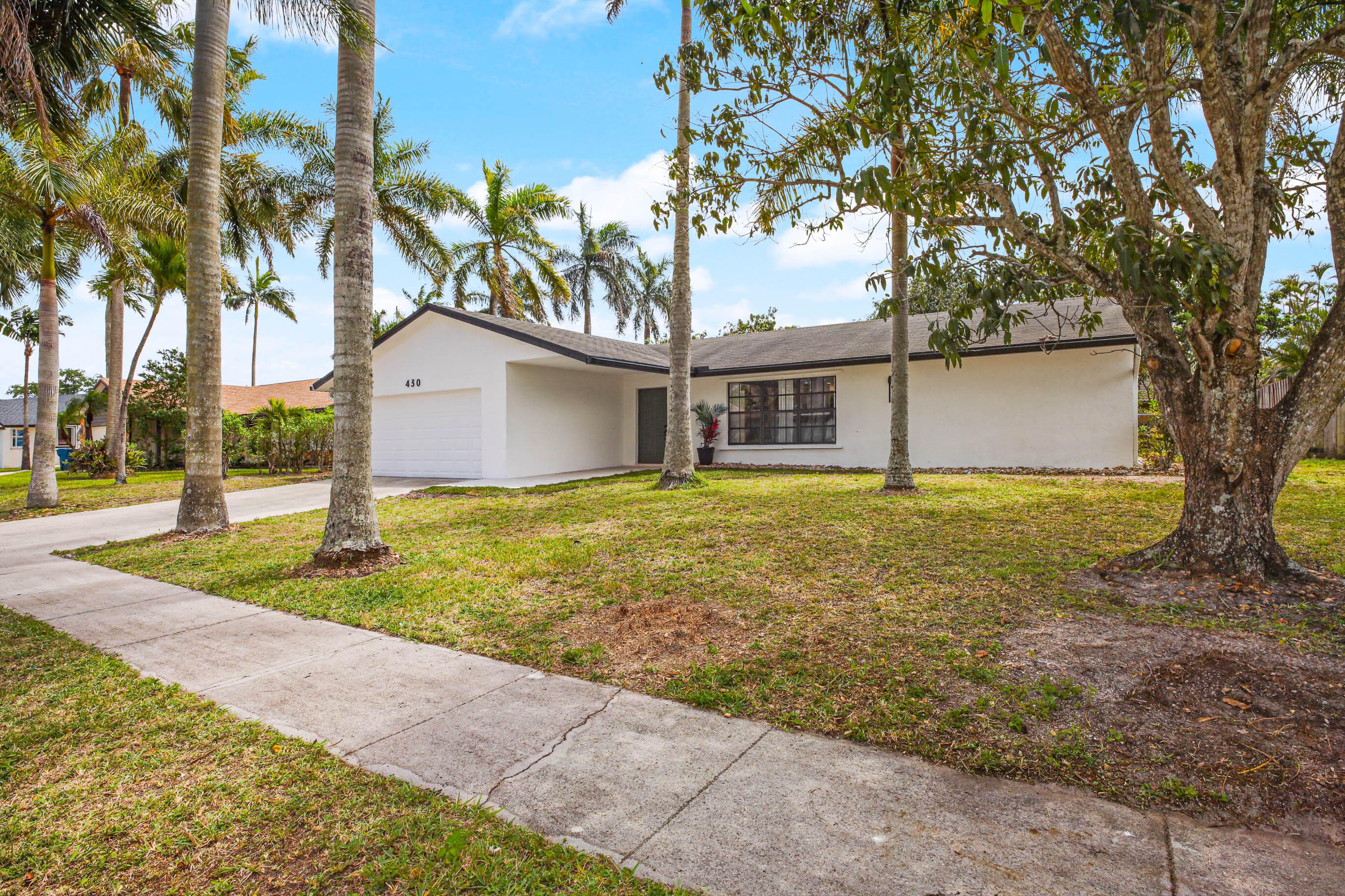 430 La Mancha Avenue, Royal Palm Beach, FL 33411 — photo 48 of 56