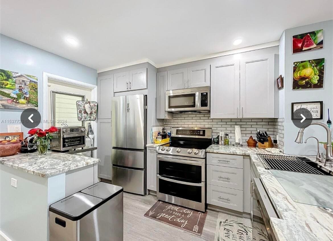 460 Paradise Isle Boulevard 205, Hallandale Beach, FL 33009 — photo 1 of 26