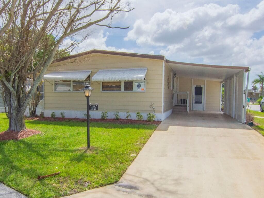 225 NE Forrest Court, Jensen Beach, FL 34957 — photo 1 of 33