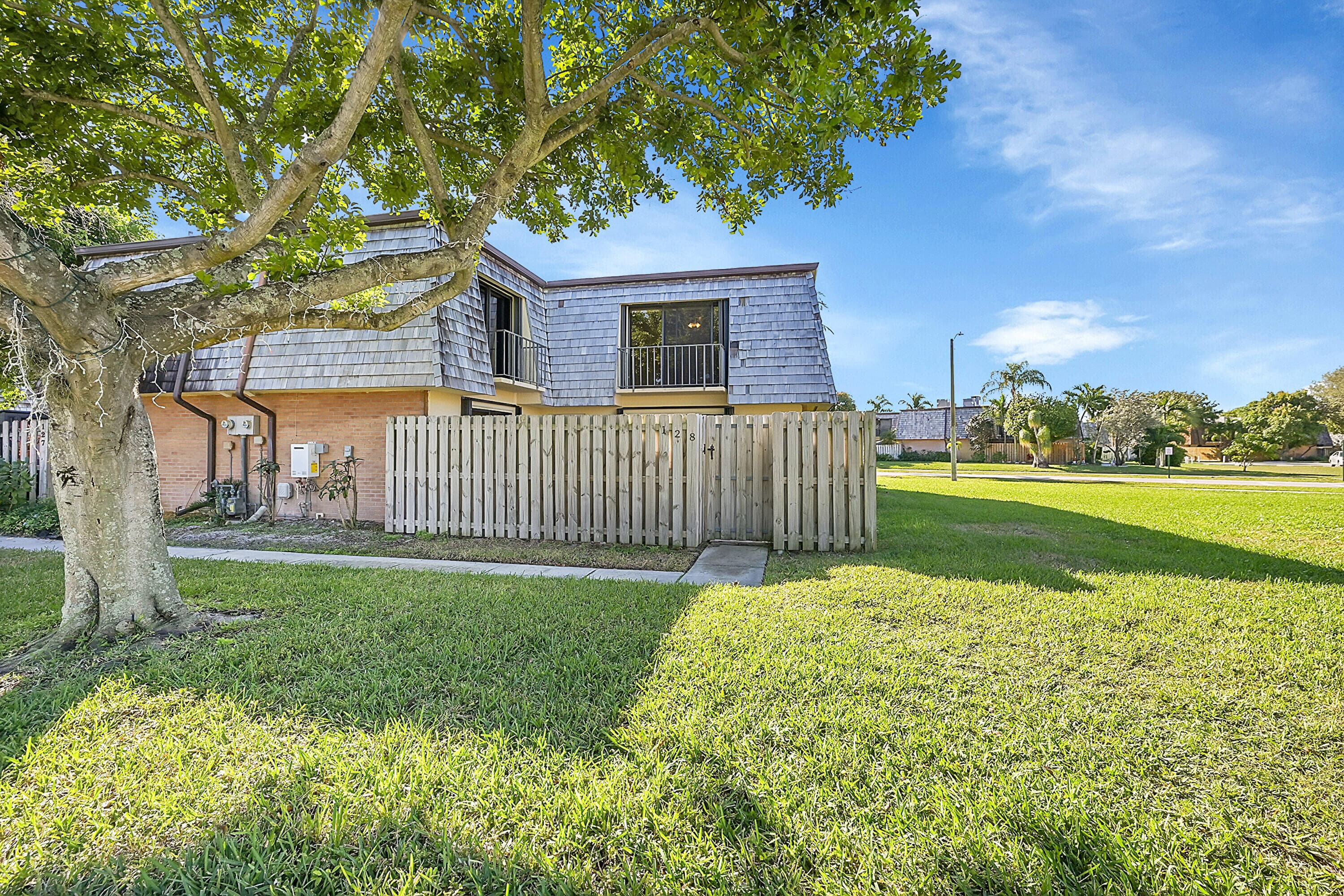 128 Lake Arbor Drive, Palm Springs, FL 33461 — photo 1 of 22