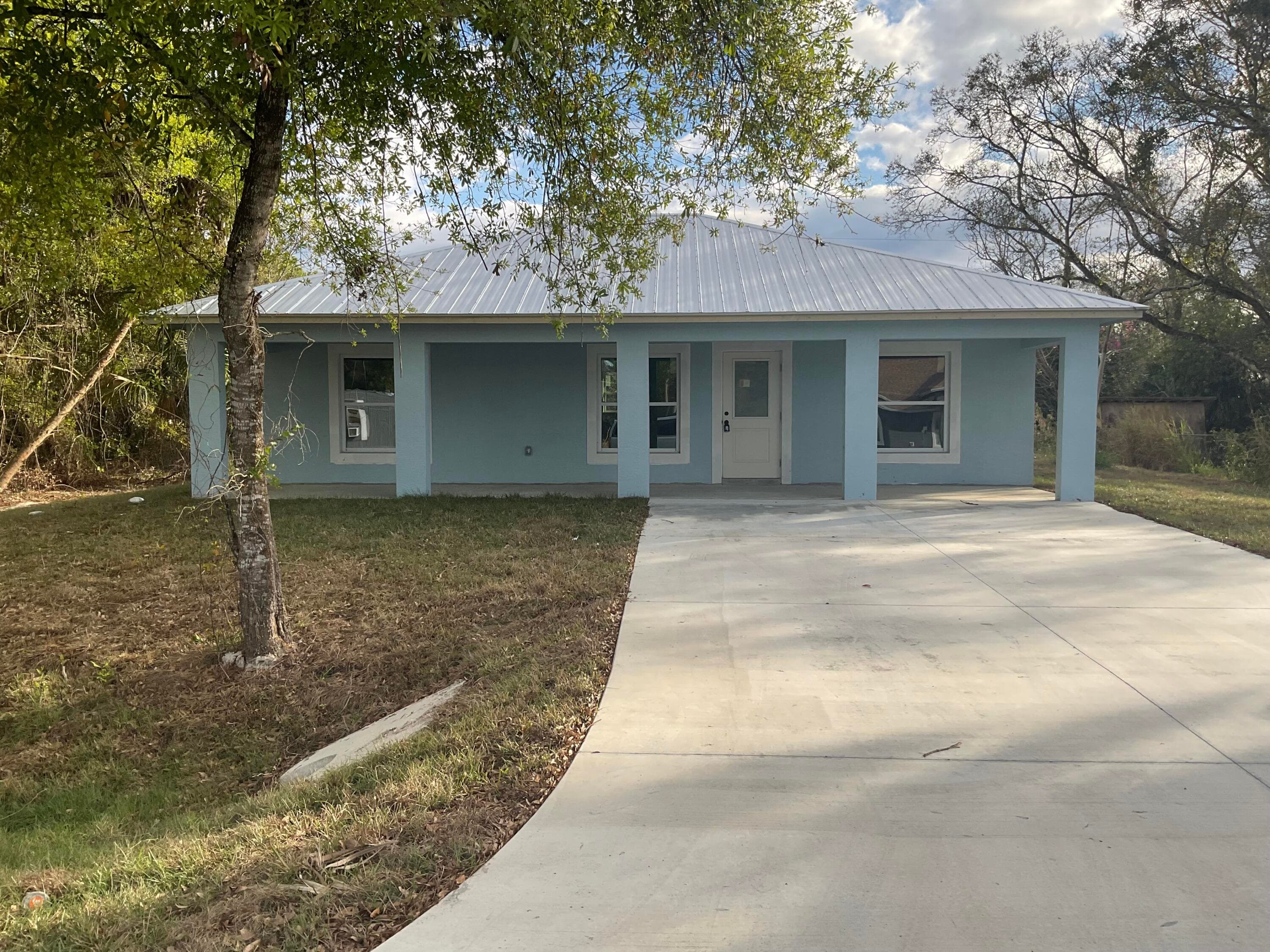 2432 NW 5th Street, Okeechobee, FL 34972 — photo 1 of 19