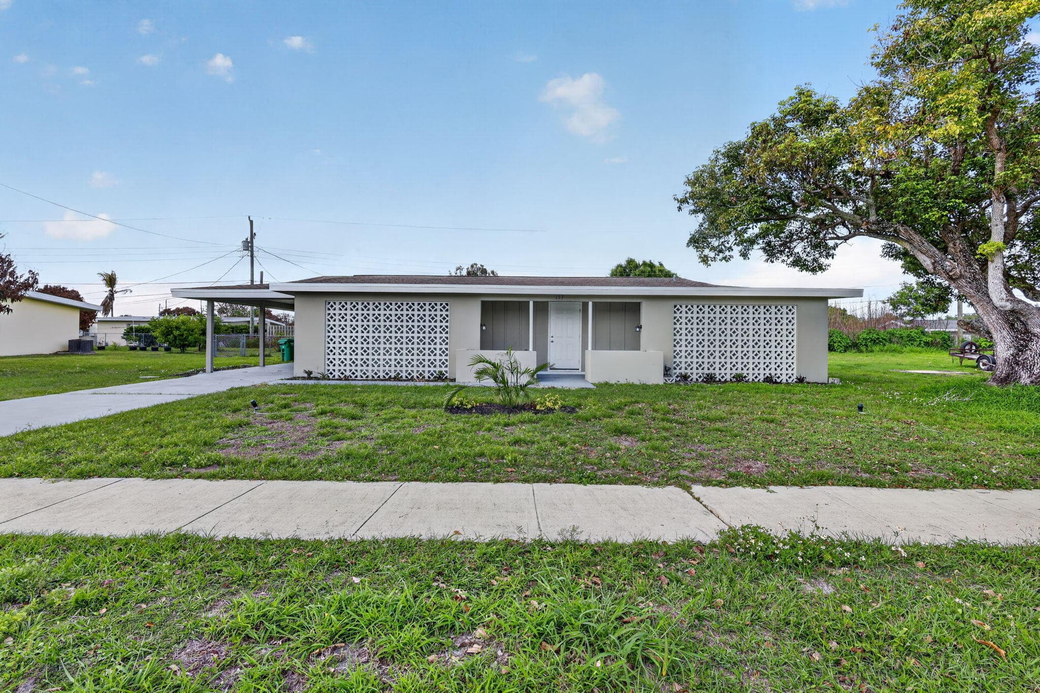 157 SE Calmoso Drive, Port St. Lucie, FL 34983 — photo 1 of 18