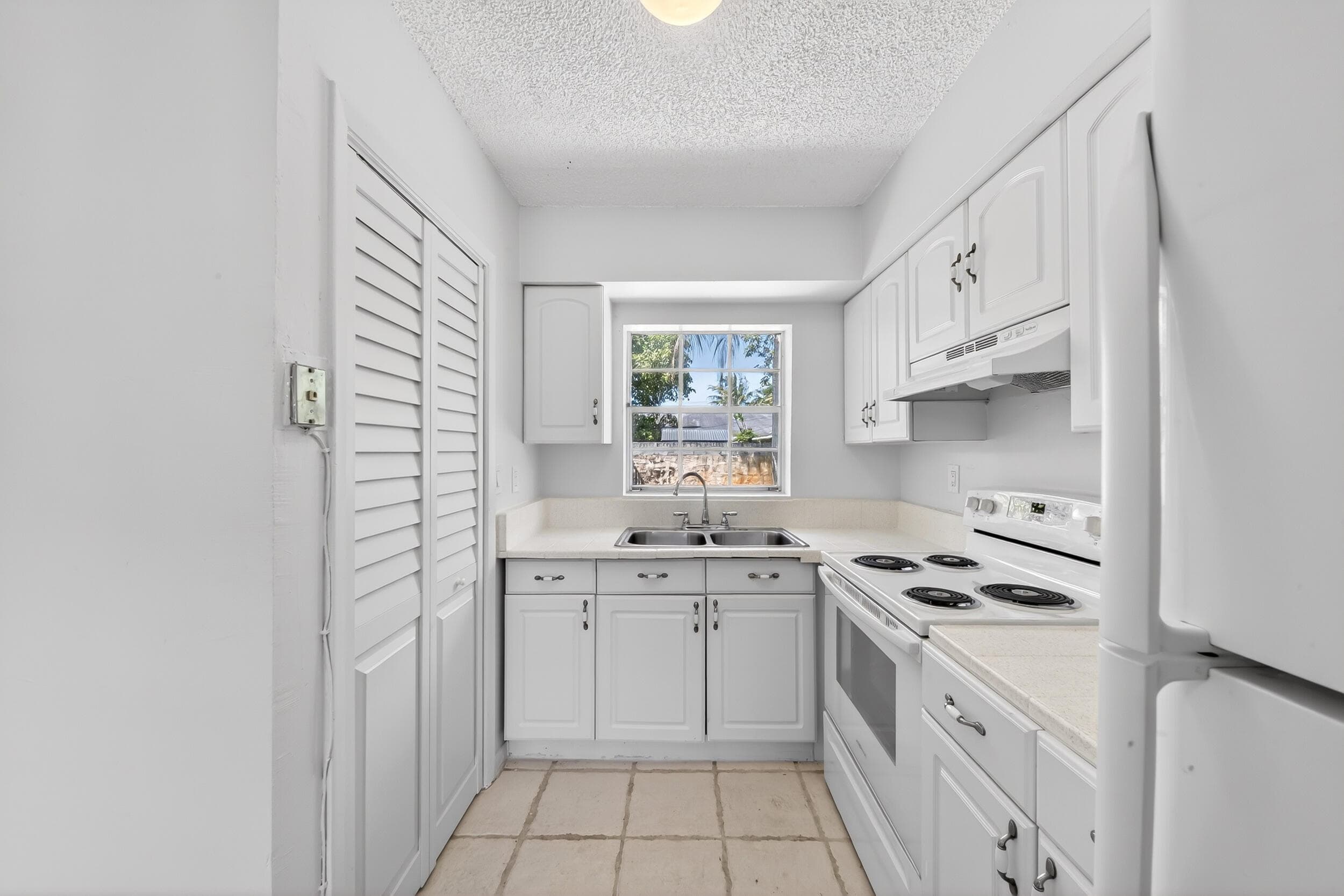 121 NW 56th Court 1-2, Oakland Park, FL 33309 — photo 7 of 24
