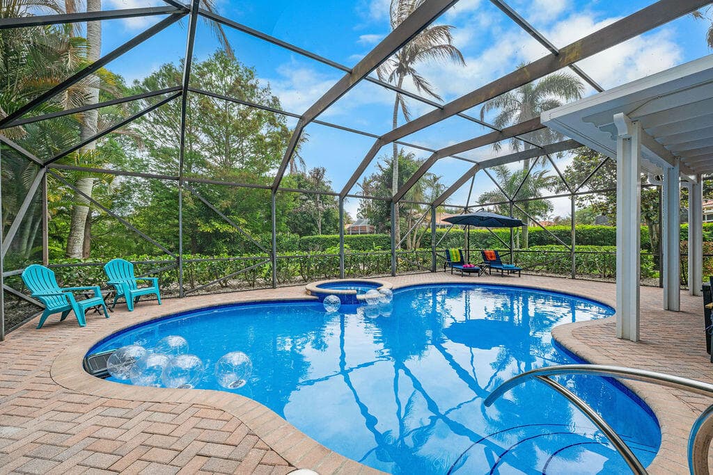 9931 SE Osprey Pointe Drive, Hobe Sound, FL 33455 — photo 4 of 56