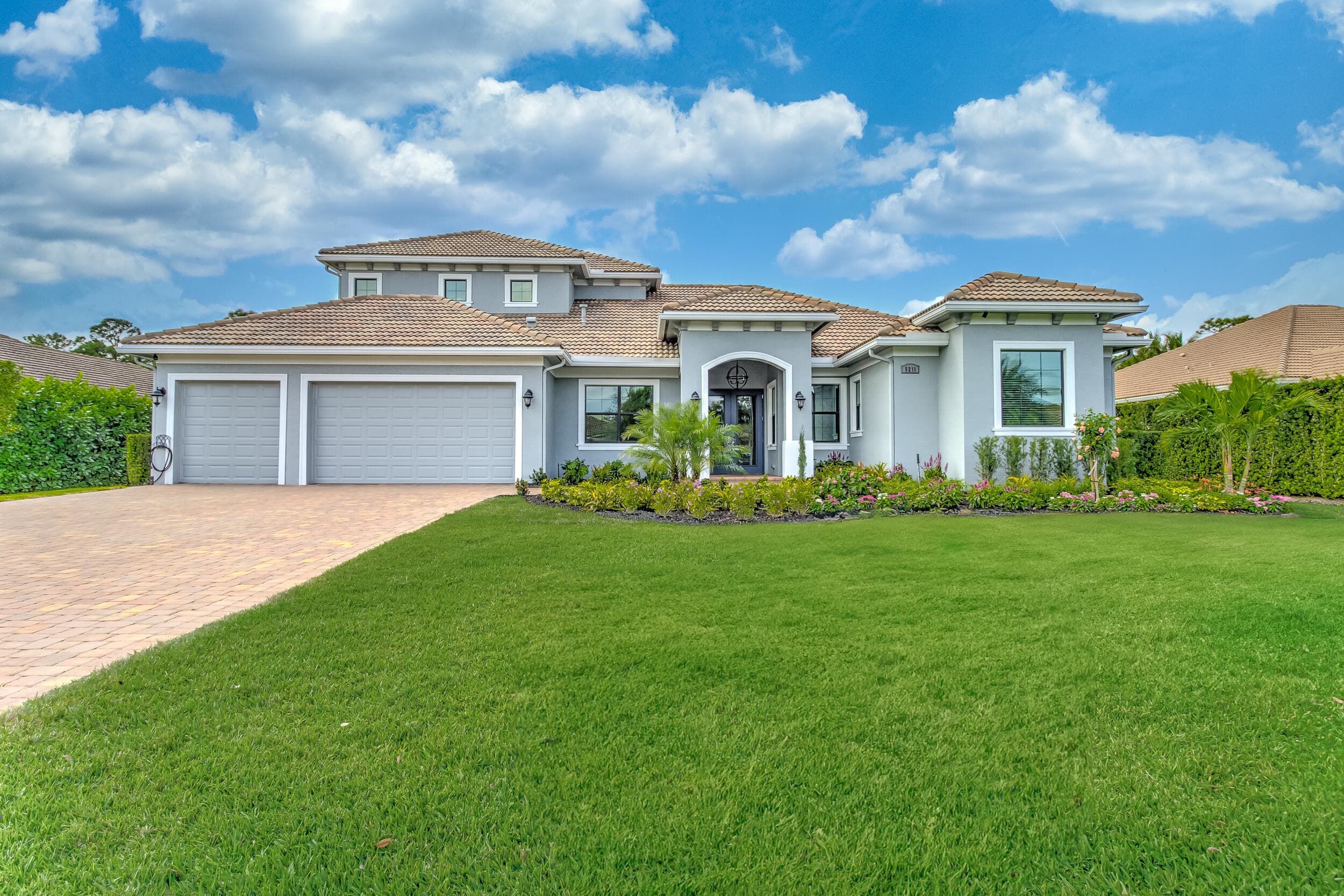 5211 SW Blue Daze Way, Palm City, FL 34990 — photo 1 of 58