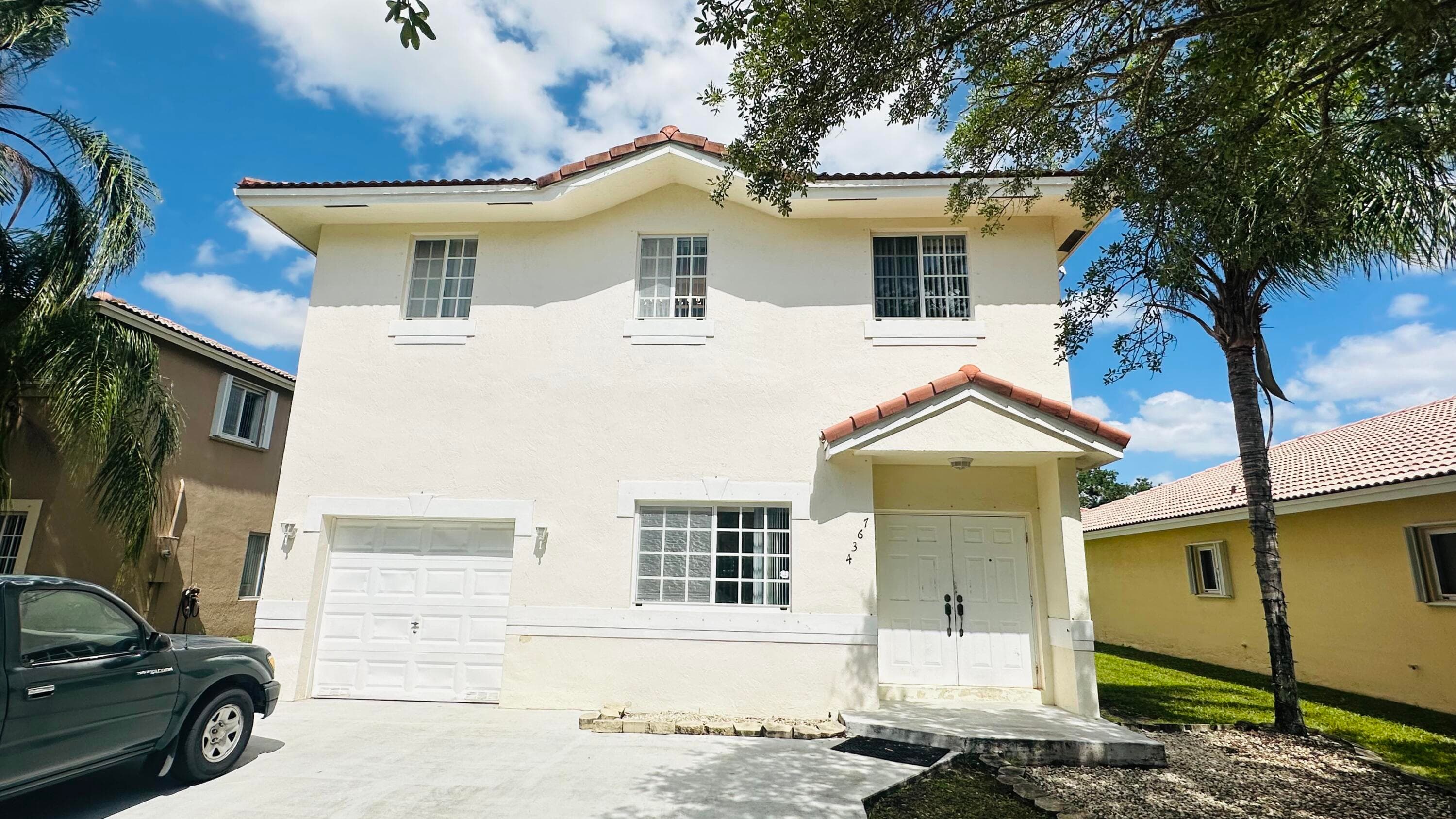 7634 NW 99th Way NW, Tamarac, FL 33321 — photo 1 of 32