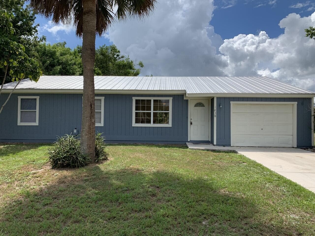 1838 SE North Buttonwood Drive, Port St. Lucie, FL 34952 — photo 1 of 14