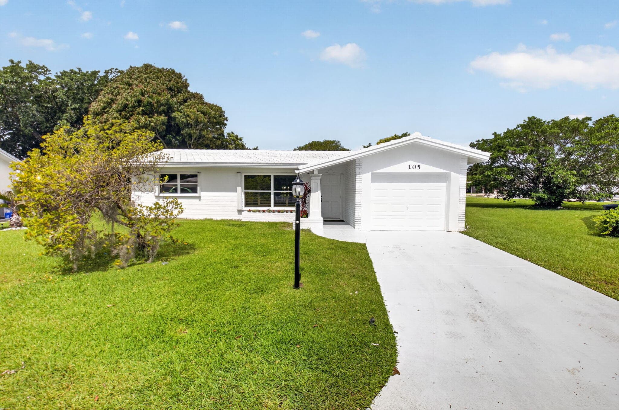 105 NW 8th Place, Boynton Beach, FL 33426 — photo 1 of 55