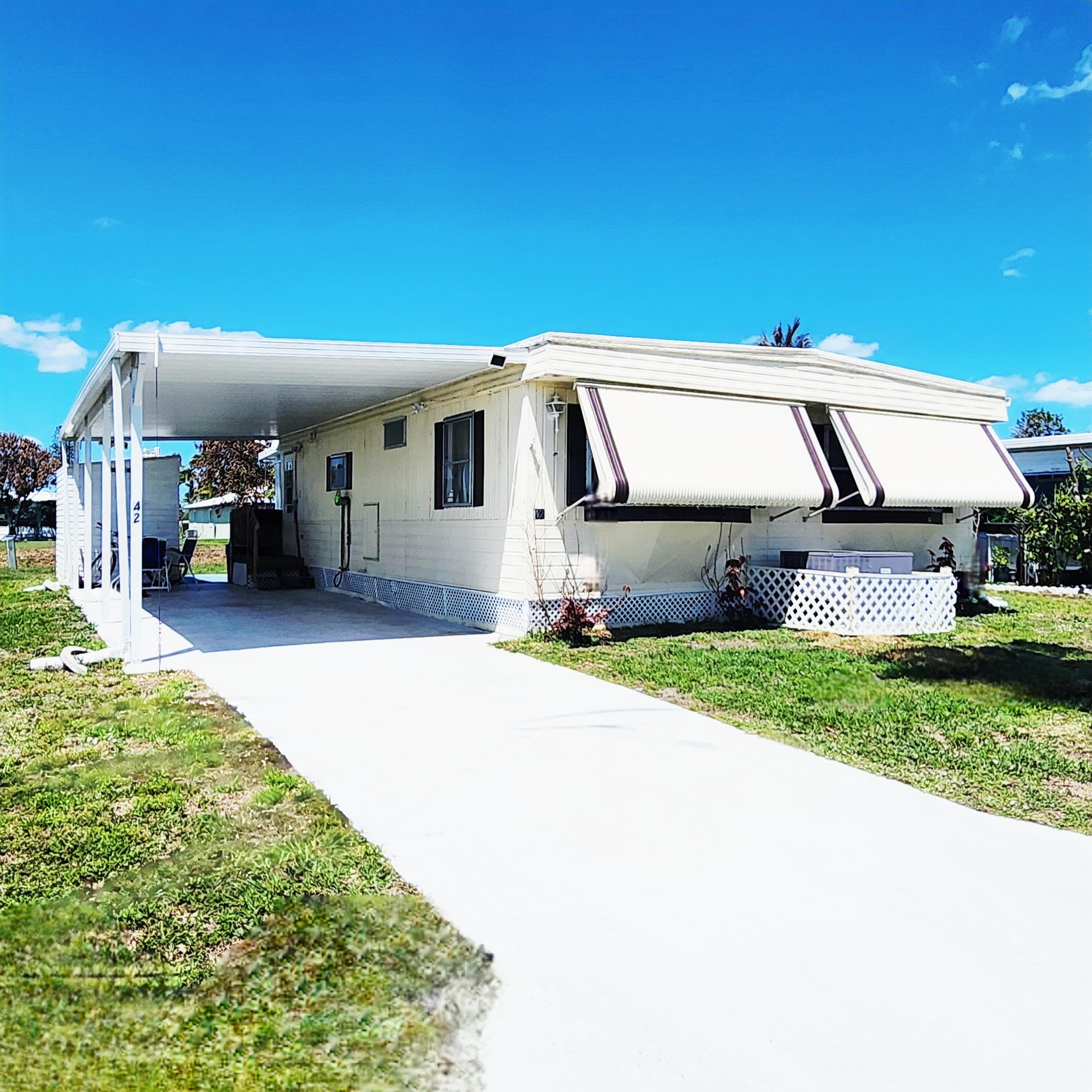 42 SE Spanish Way, Port St. Lucie, FL 34952 — photo 1 of 55