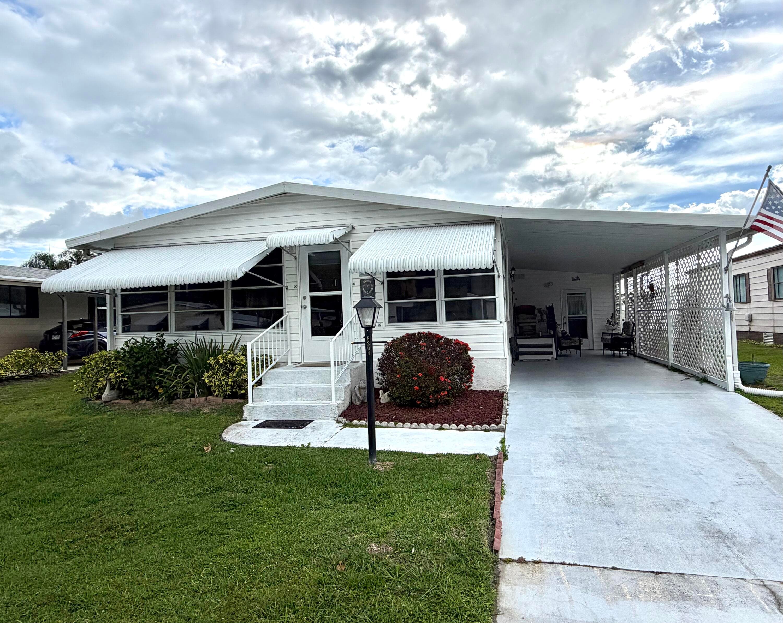 8204 W Bitterbush Lane, Port St. Lucie, FL 34952 — photo 2 of 65