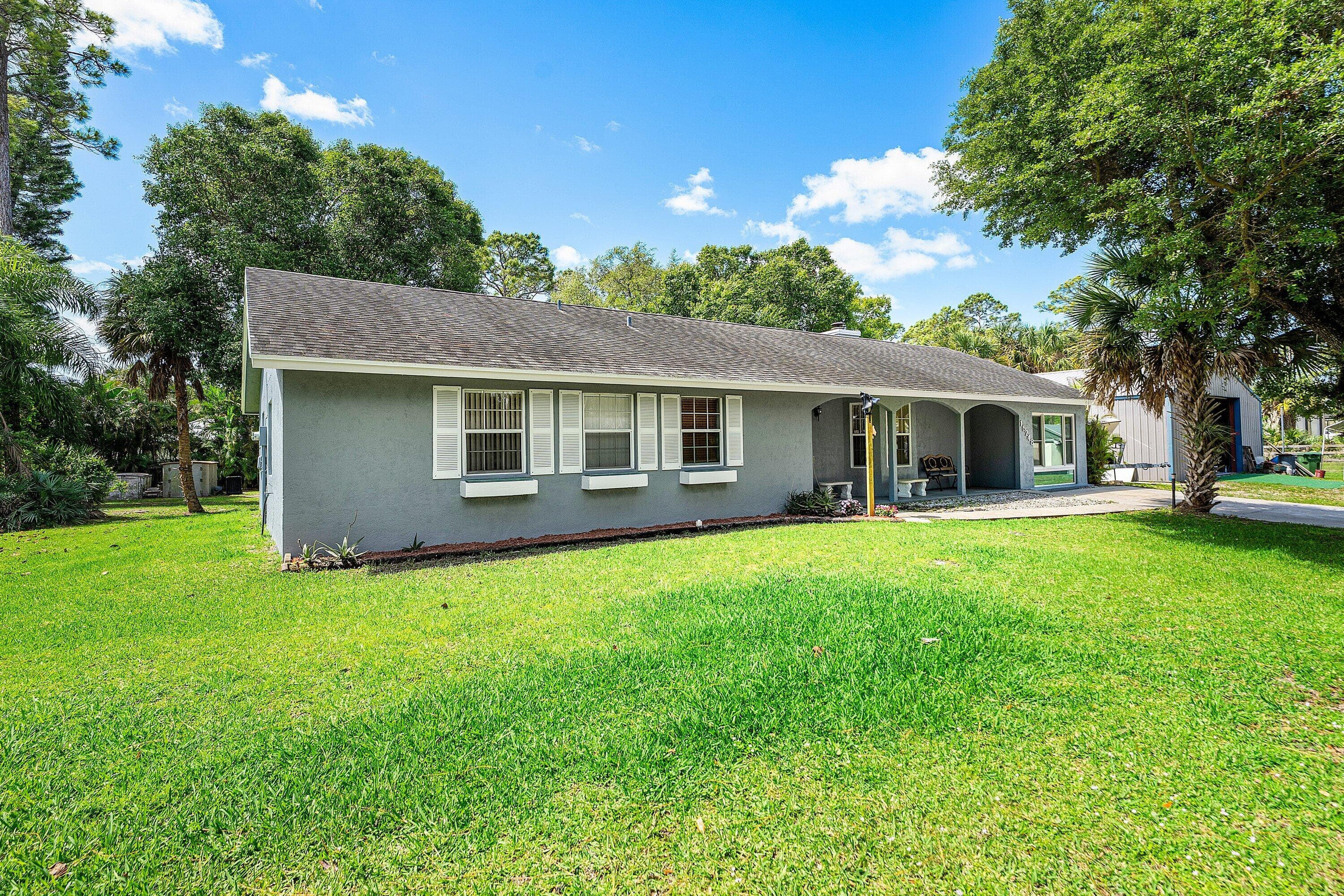 15248 77th Place N, Loxahatchee, FL 33470 — photo 1 of 49