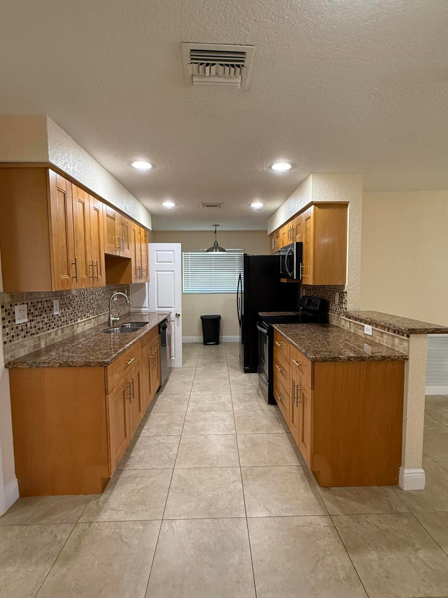7302 NW 57th Court, Tamarac, FL 33321 — photo 2 of 8