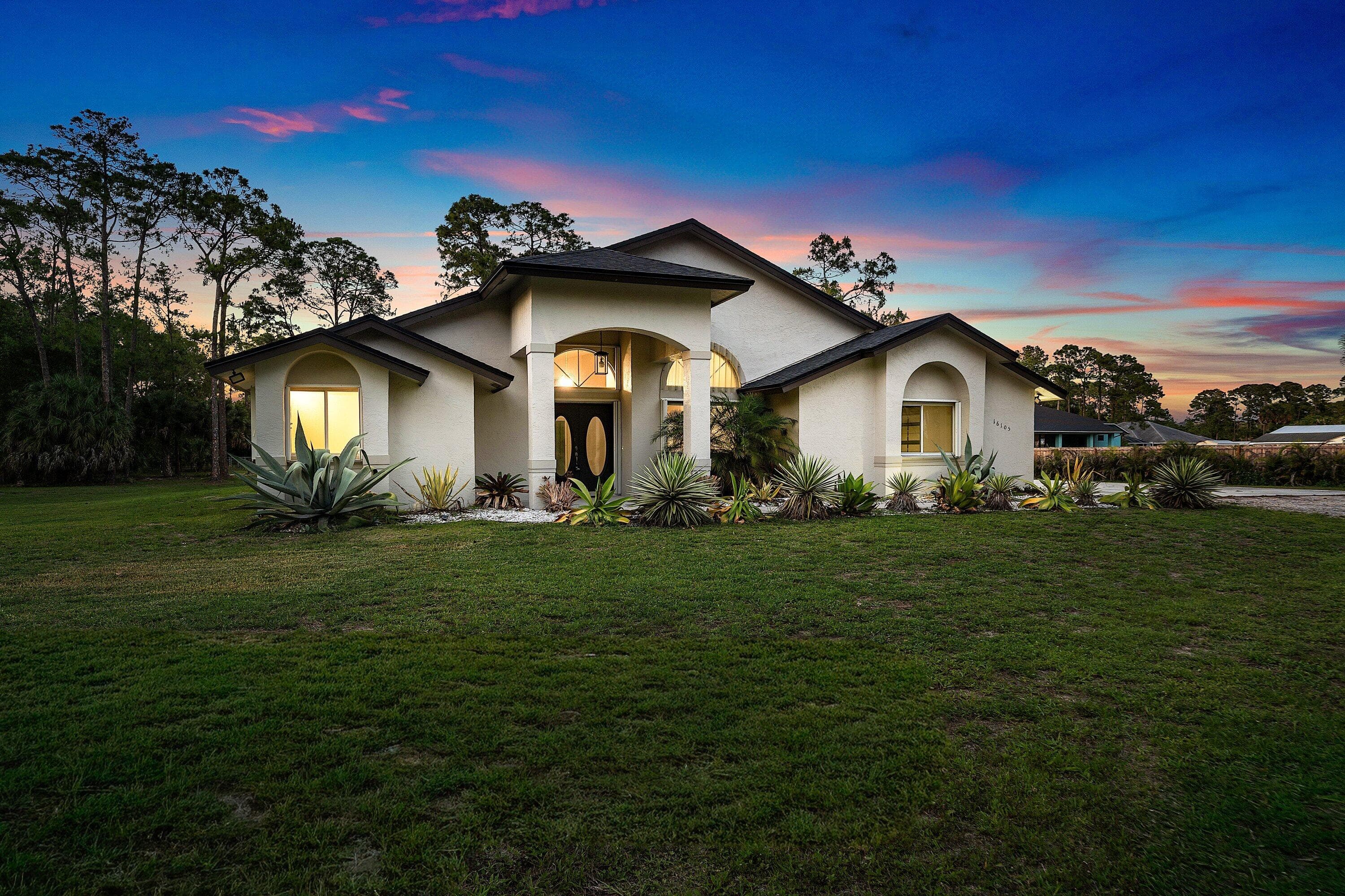 16105 Temple Boulevard, The Acreage, FL 33470 — photo 1 of 77