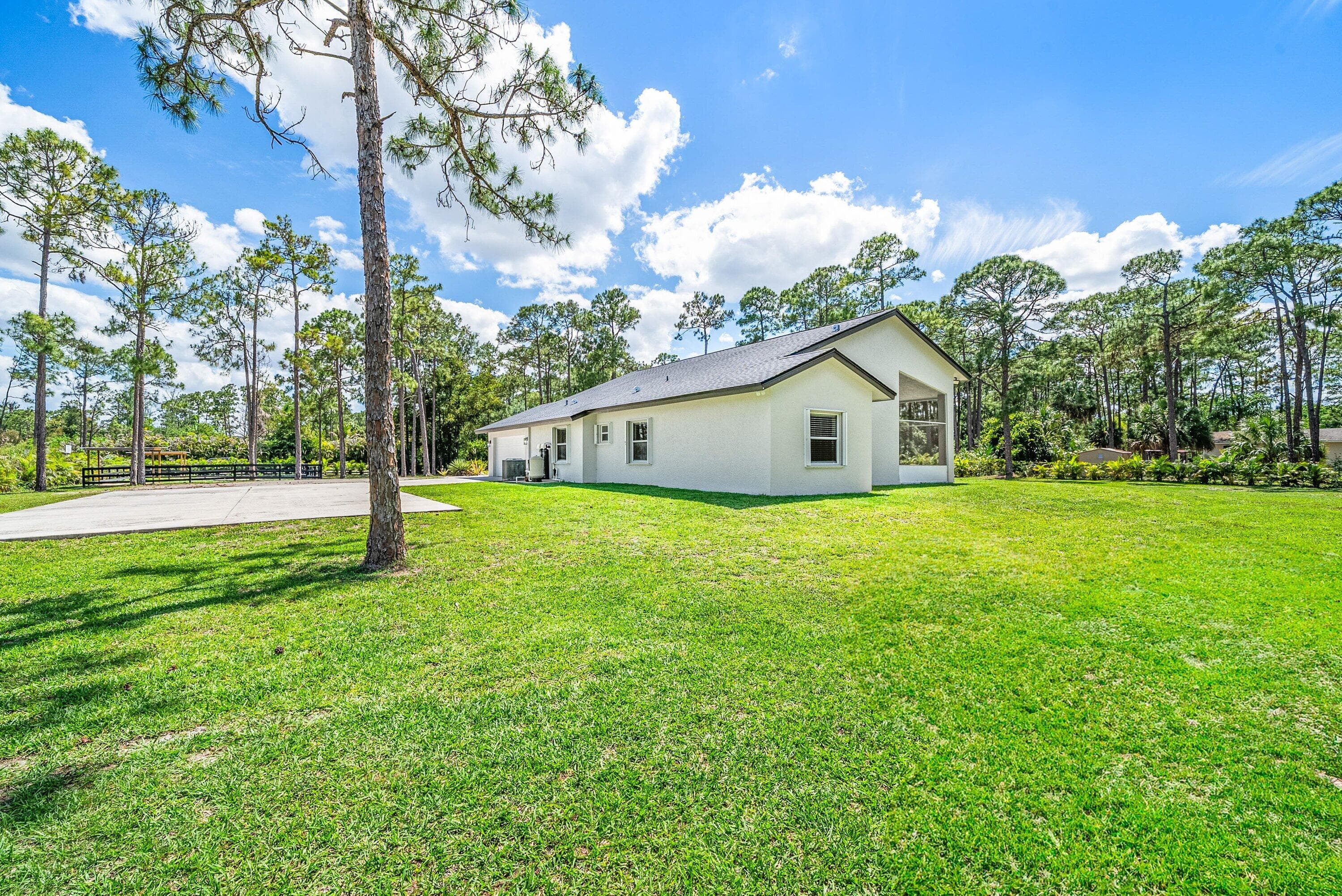 16105 Temple Boulevard, The Acreage, FL 33470 — photo 12 of 77