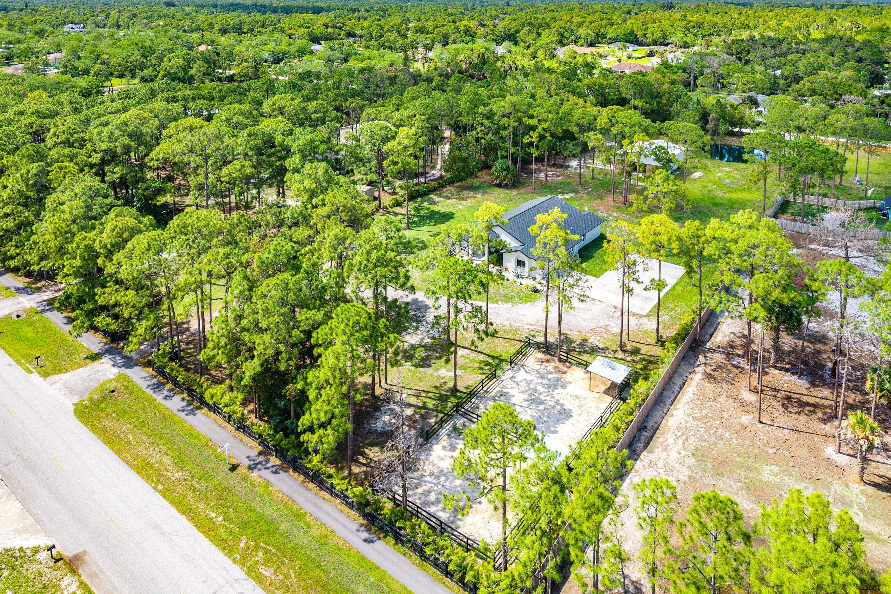 16105 Temple Boulevard, The Acreage, FL 33470 — photo 2 of 77