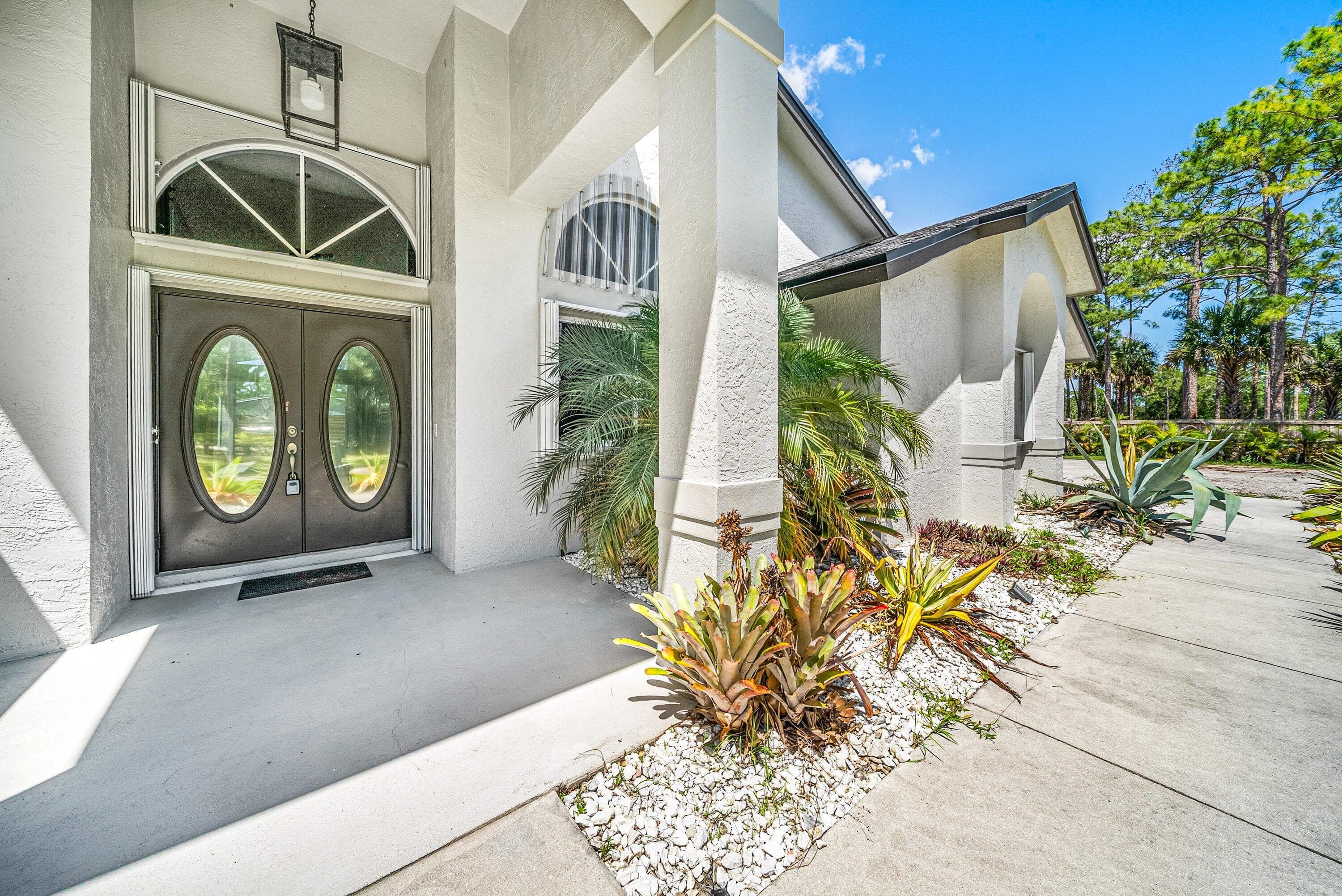 16105 Temple Boulevard, The Acreage, FL 33470 — photo 32 of 77