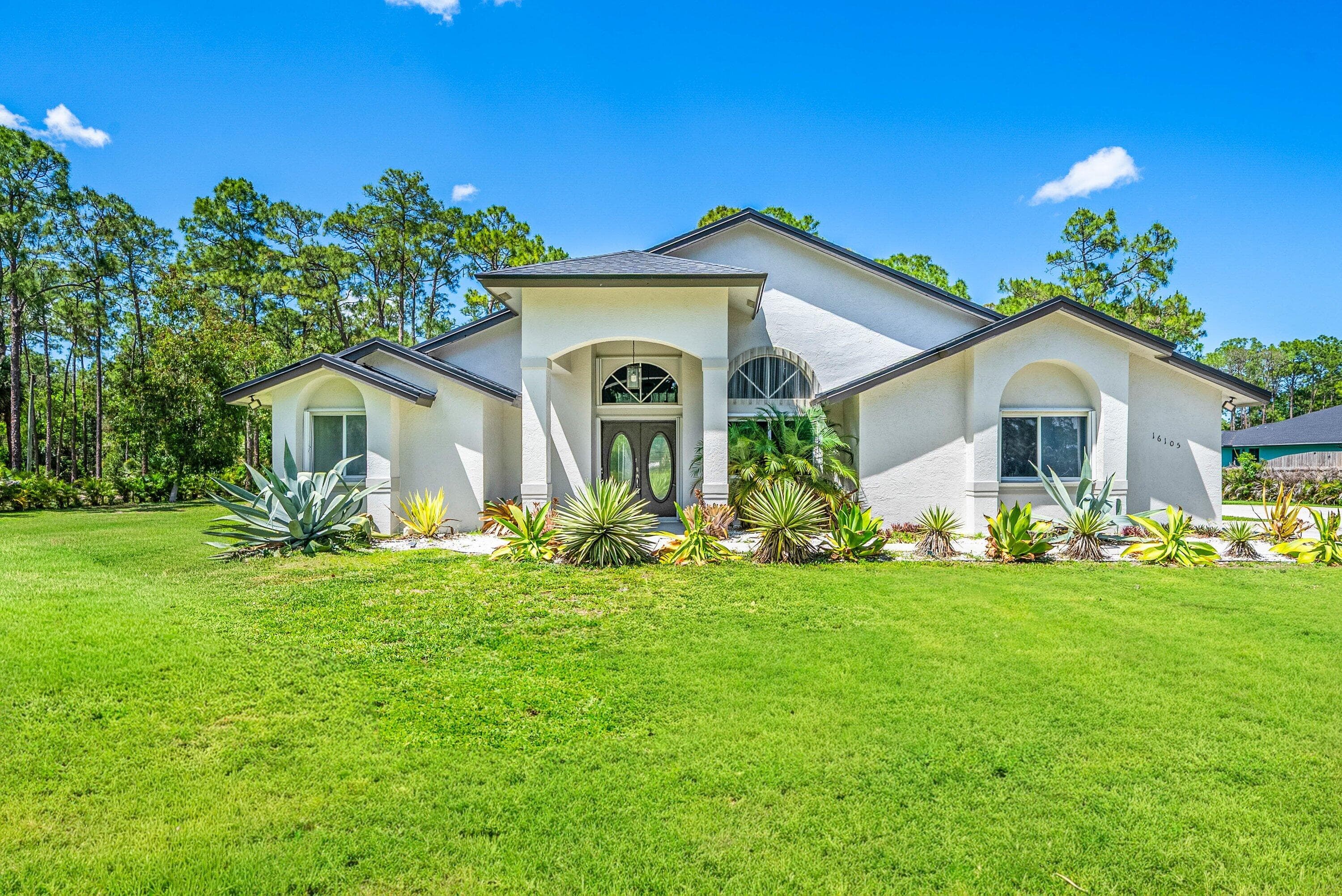 16105 Temple Boulevard, The Acreage, FL 33470 — photo 31 of 77