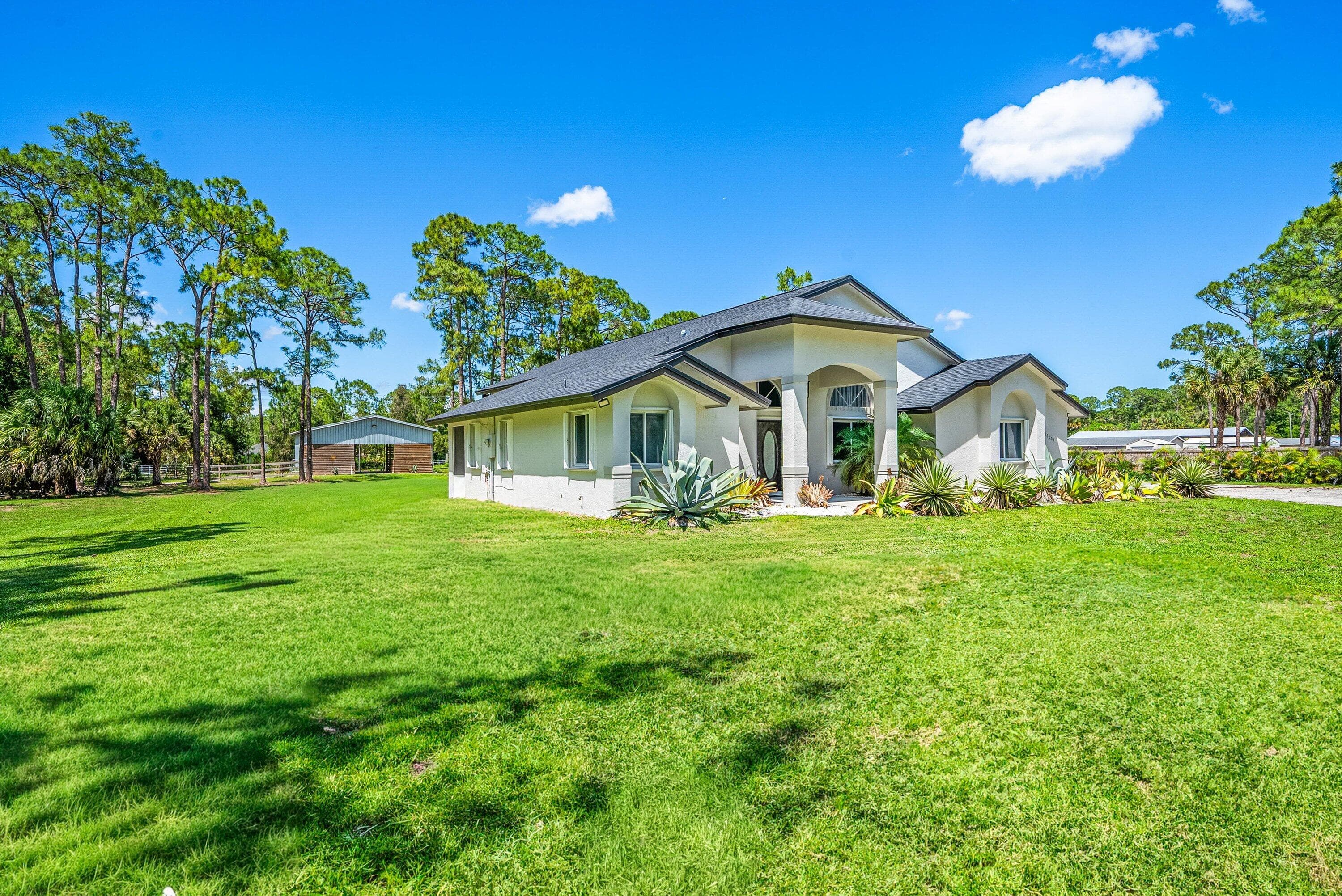 16105 Temple Boulevard, The Acreage, FL 33470 — photo 15 of 77
