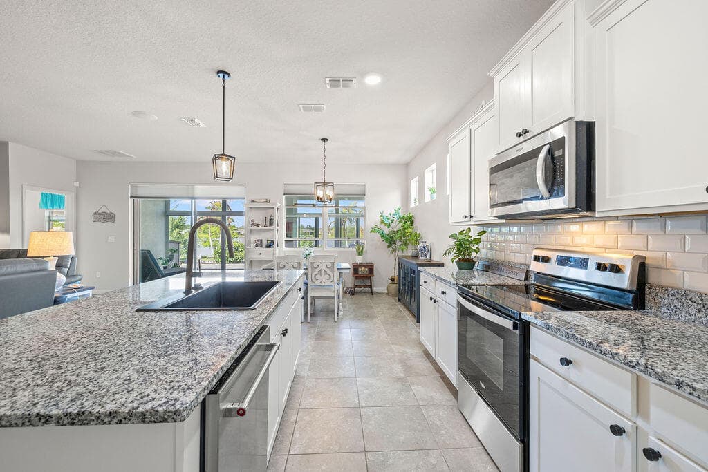 2165 SW Hawk River Dr Drive SW, Vero Beach, FL 32962 — photo 12 of 56