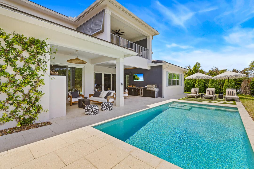 2465 NE Evinrude Circle, Jensen Beach, FL 34957 — photo 1 of 83