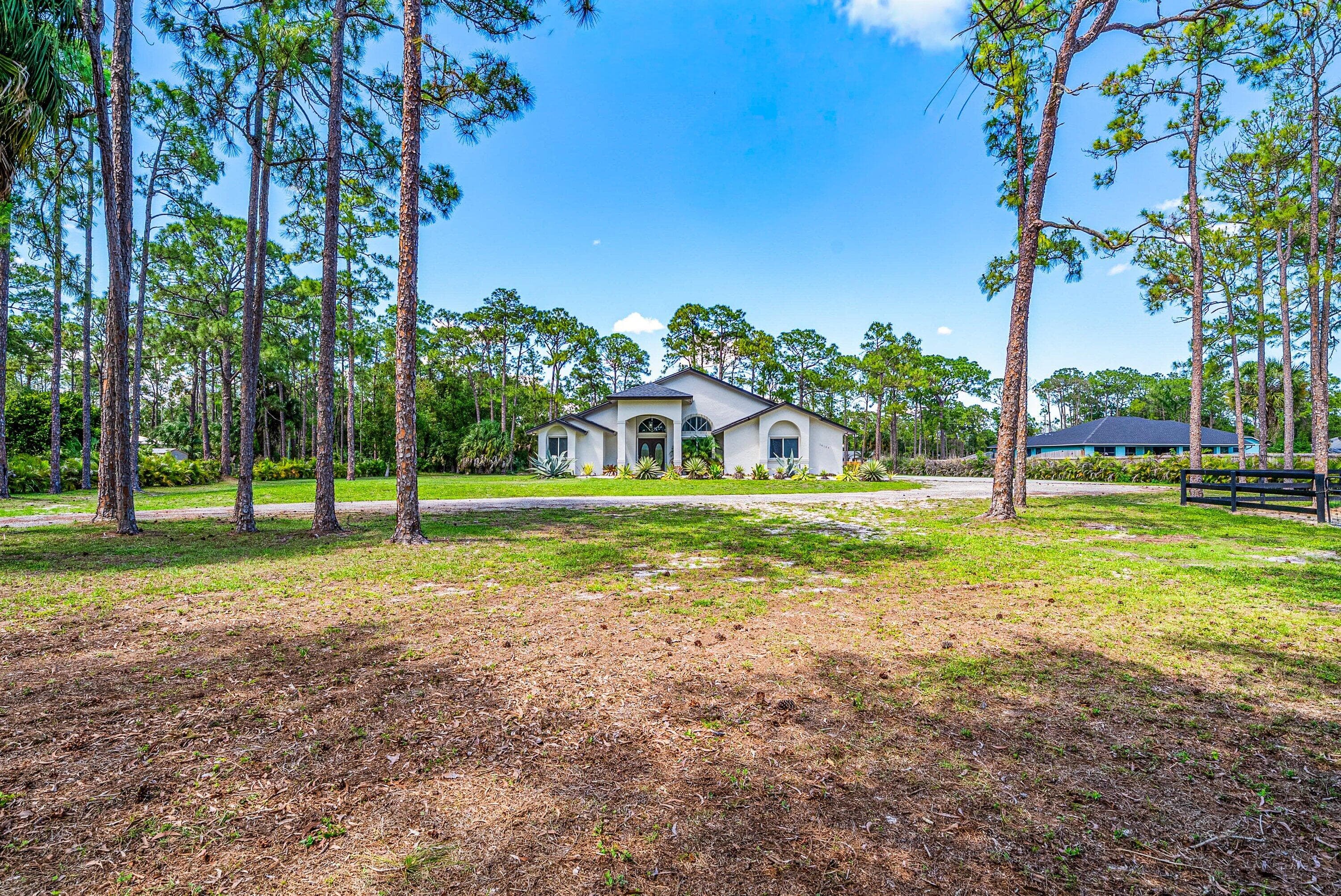 16105 Temple Boulevard, The Acreage, FL 33470 — photo 3 of 77