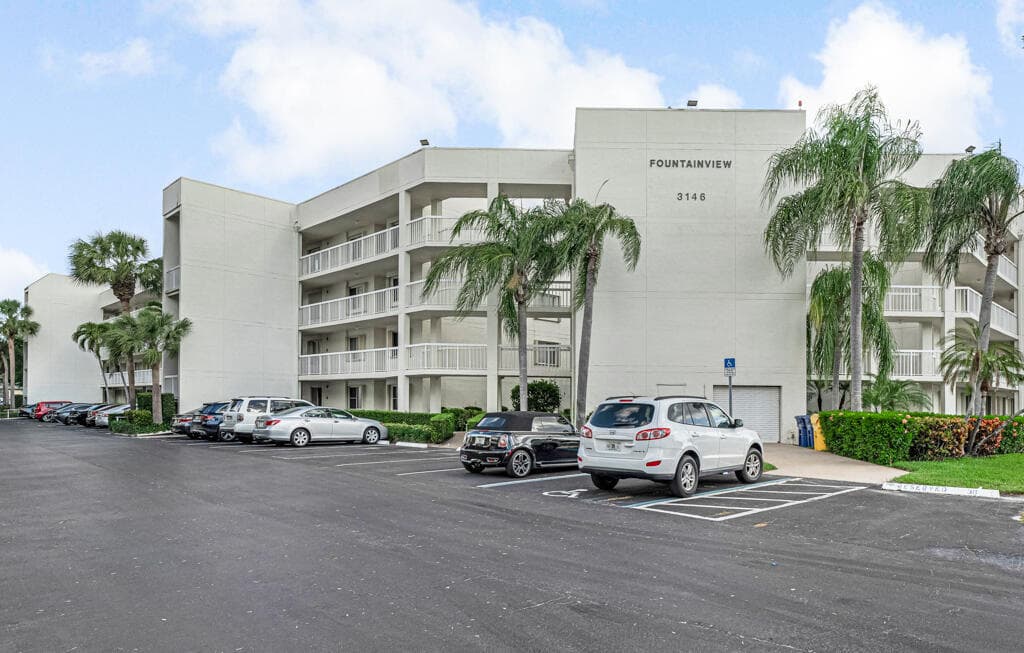 3146 Via Poinciana 203, Lake Worth, FL 33467 — photo 1 of 18