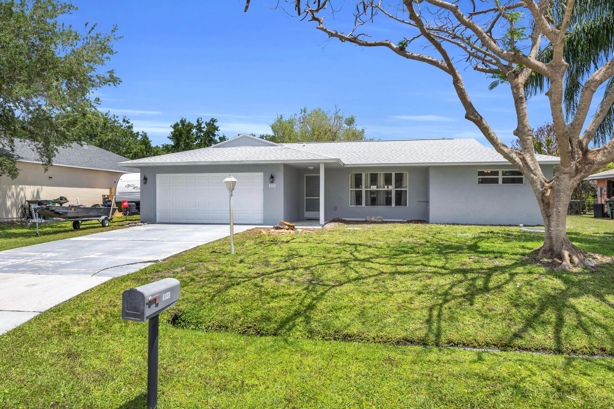 1333 SE Bayharbor Street, Port St. Lucie, FL 34983 — photo 1 of 42