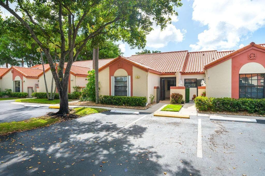 65 Centennial Court, Deerfield Beach, FL 33442 — photo 1 of 52