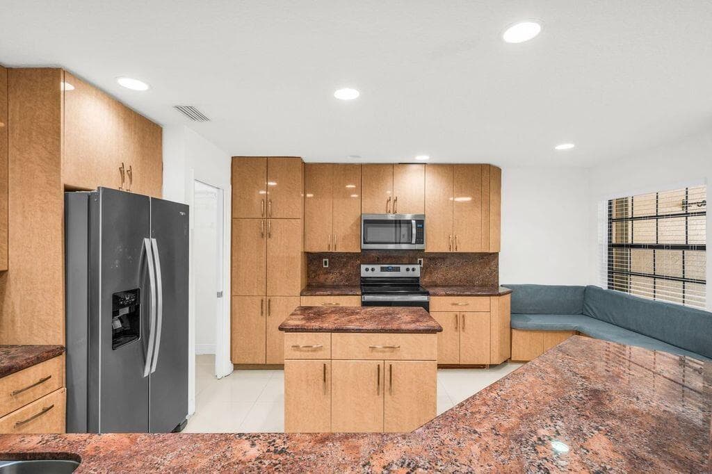 65 Centennial Court, Deerfield Beach, FL 33442 — photo 4 of 52