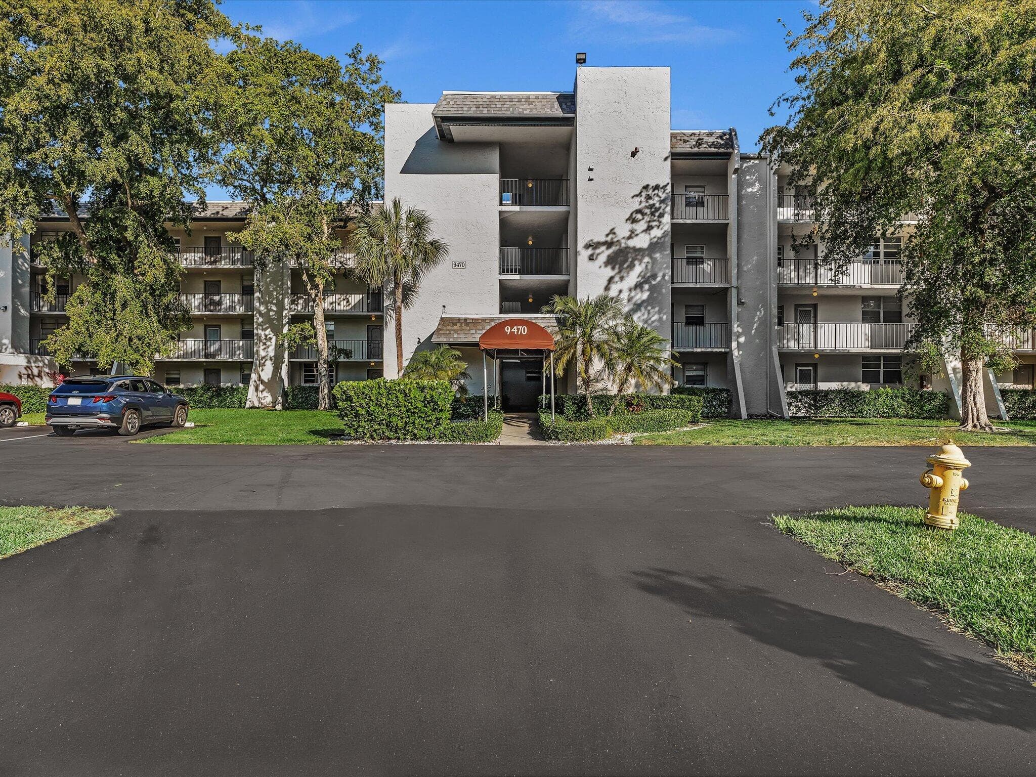 9470 Poinciana Place 303, Davie, FL 33324 — photo 1 of 77