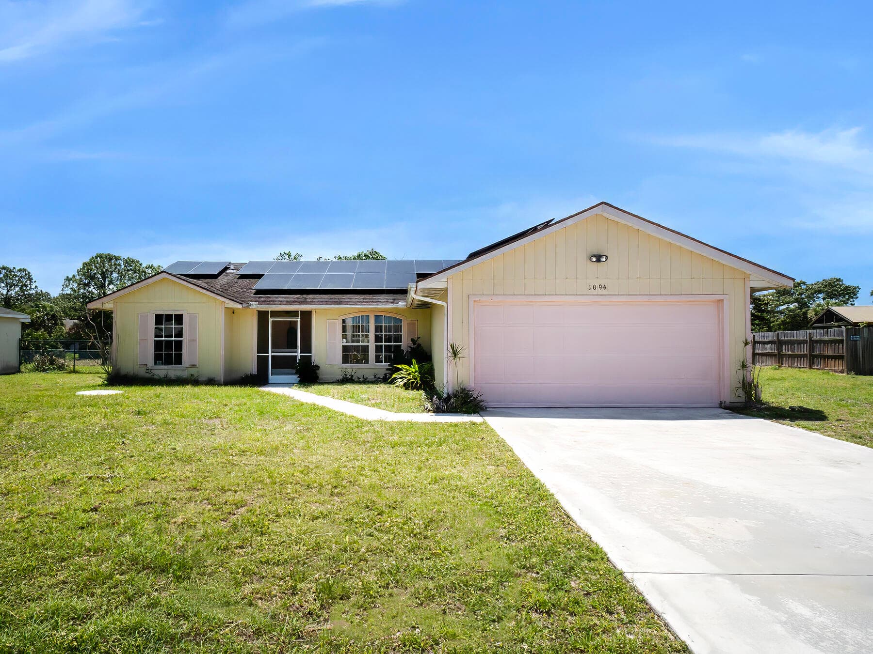 1094 SW Cairo Avenue, Port St. Lucie, FL 34953 — photo 1 of 18