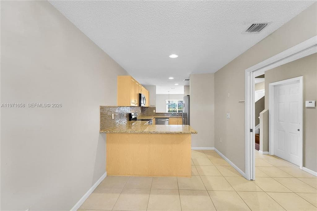 9840 NW 19th Place, Sunrise, FL 33322 — photo 2 of 16
