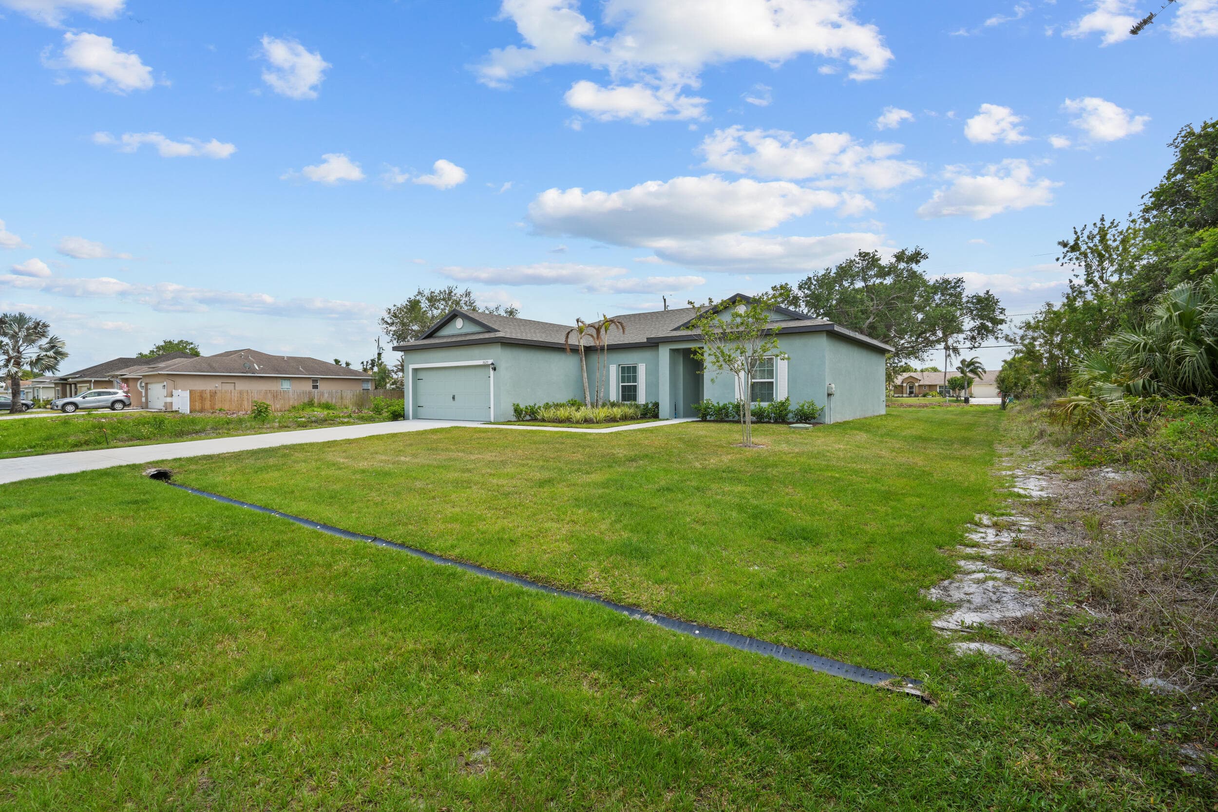 1620 SW Escobar Lane, Port St. Lucie, FL 34953 — photo 3 of 43