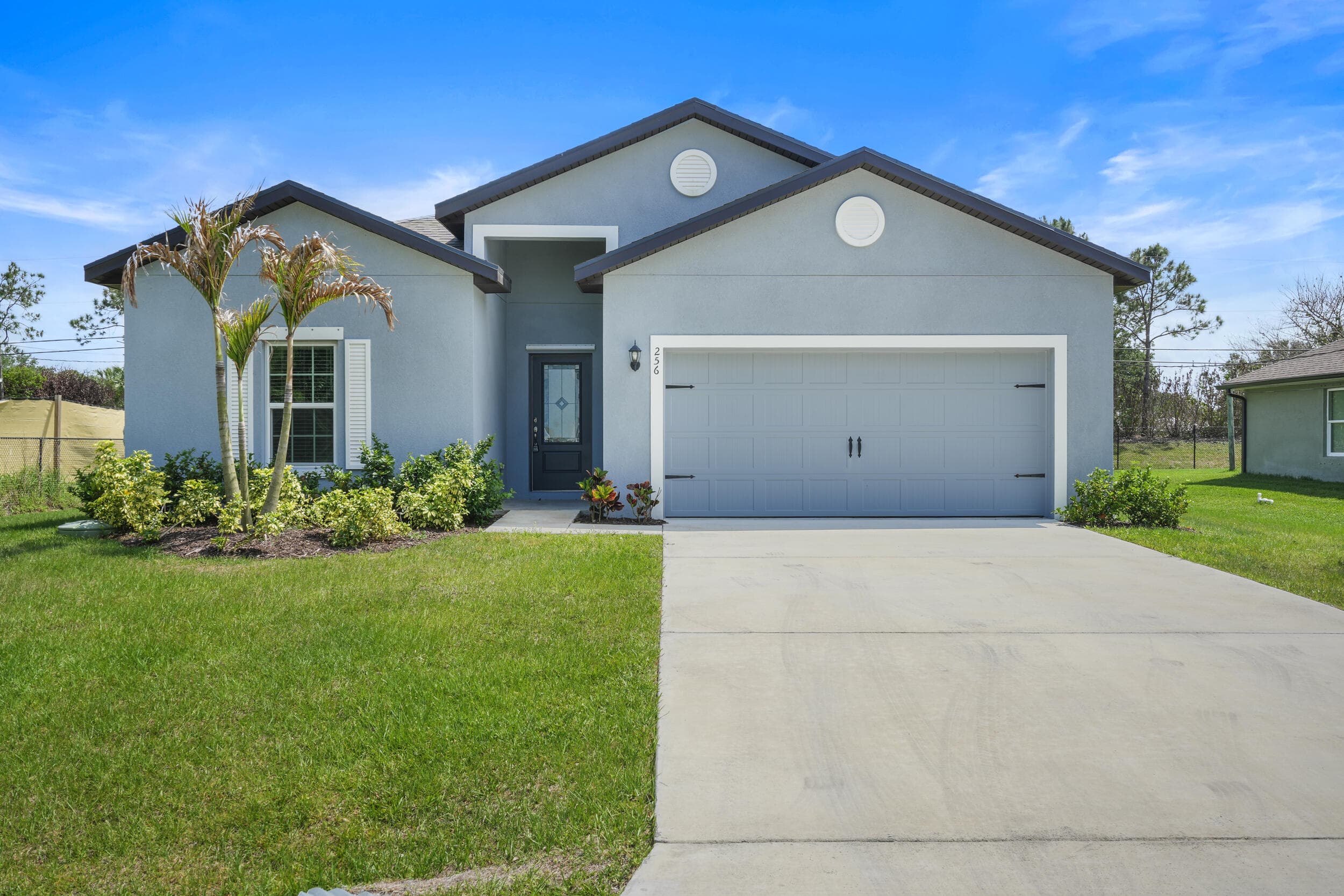 256 SW Grove Avenue, Port St. Lucie, FL 34983 — photo 1 of 51