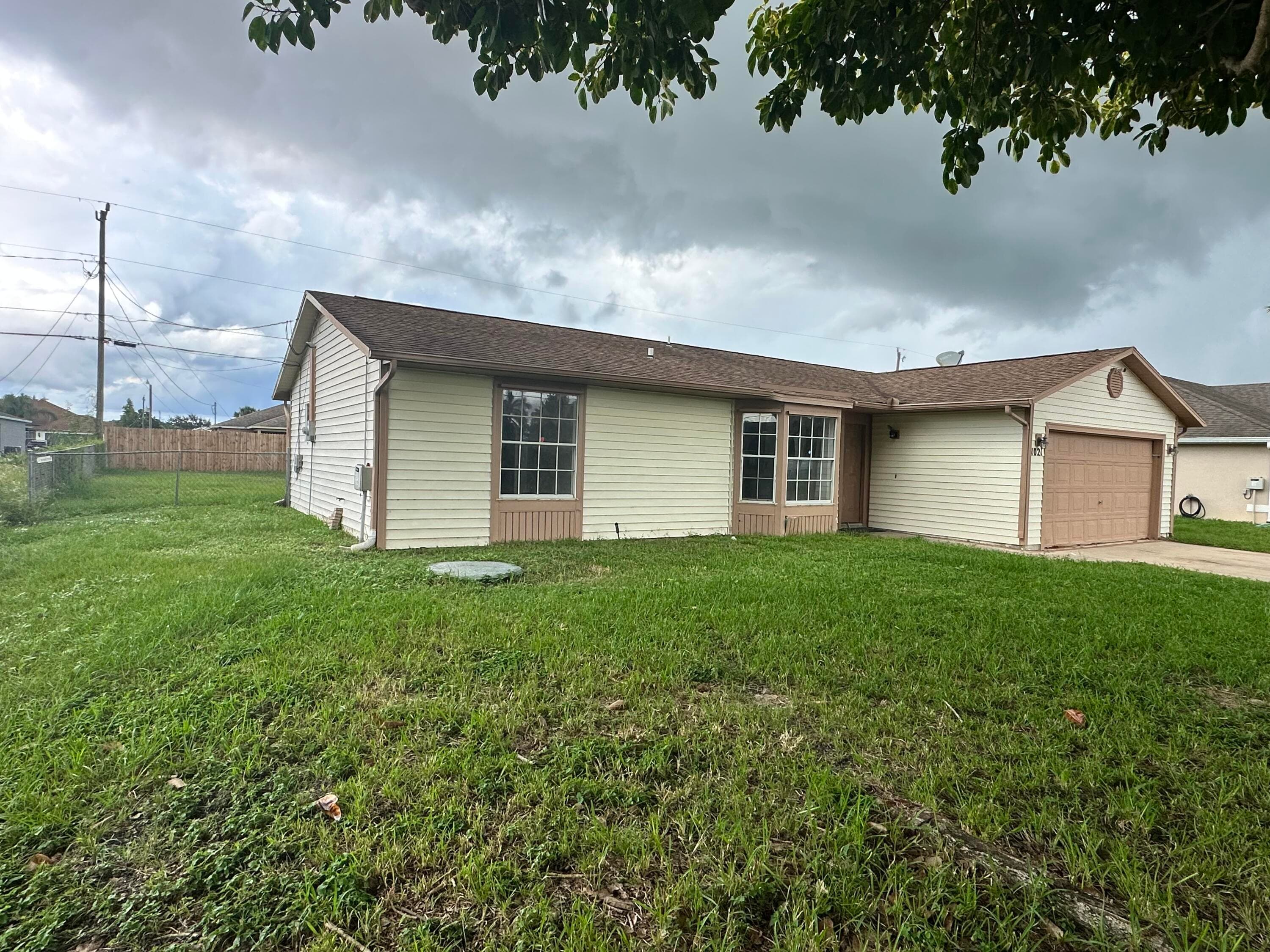 1021 SW Dubois Avenue, Port St. Lucie, FL 34953 — photo 1 of 13