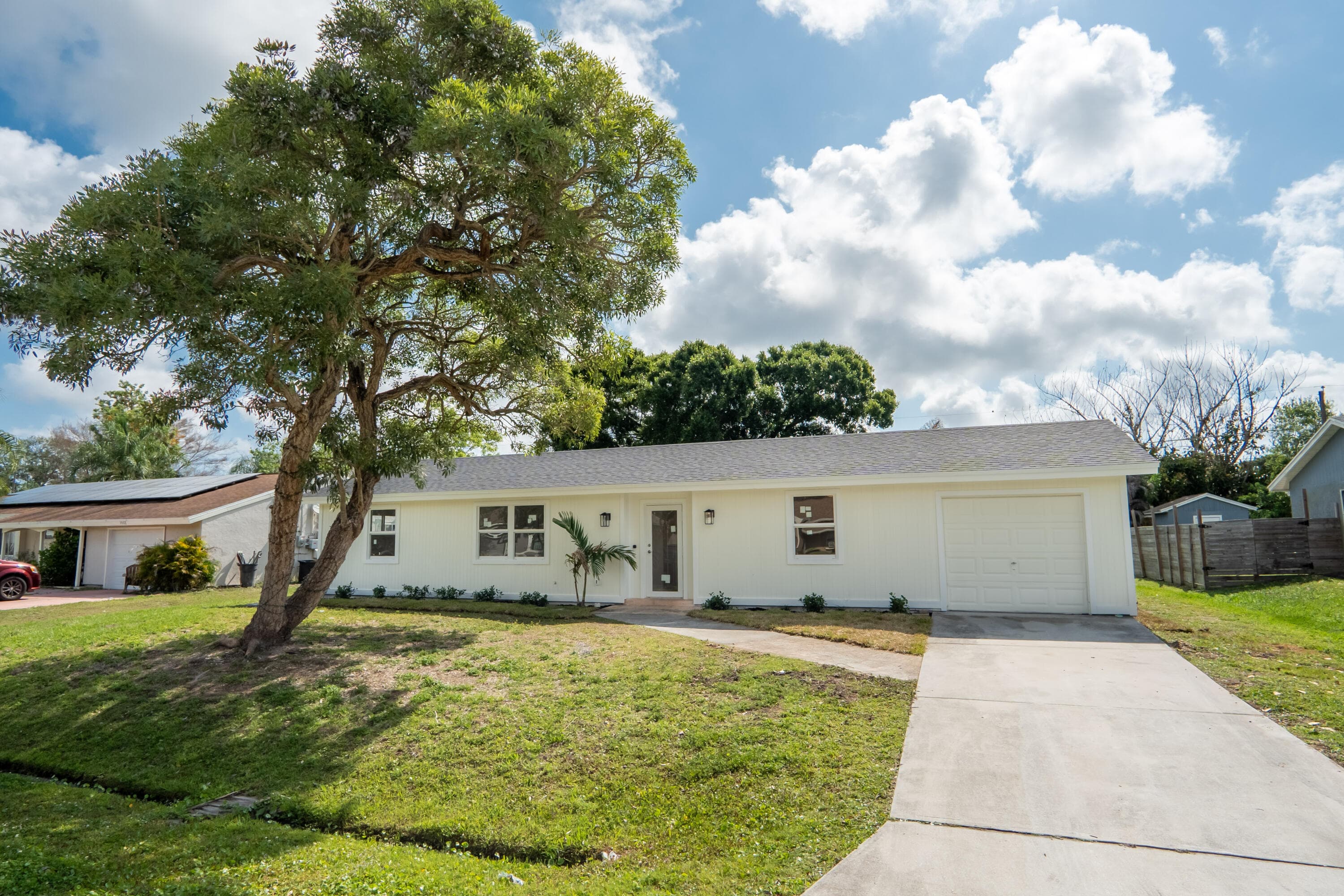 1911 SE Carvalho Street, Port St. Lucie, FL 34983 — photo 1 of 36